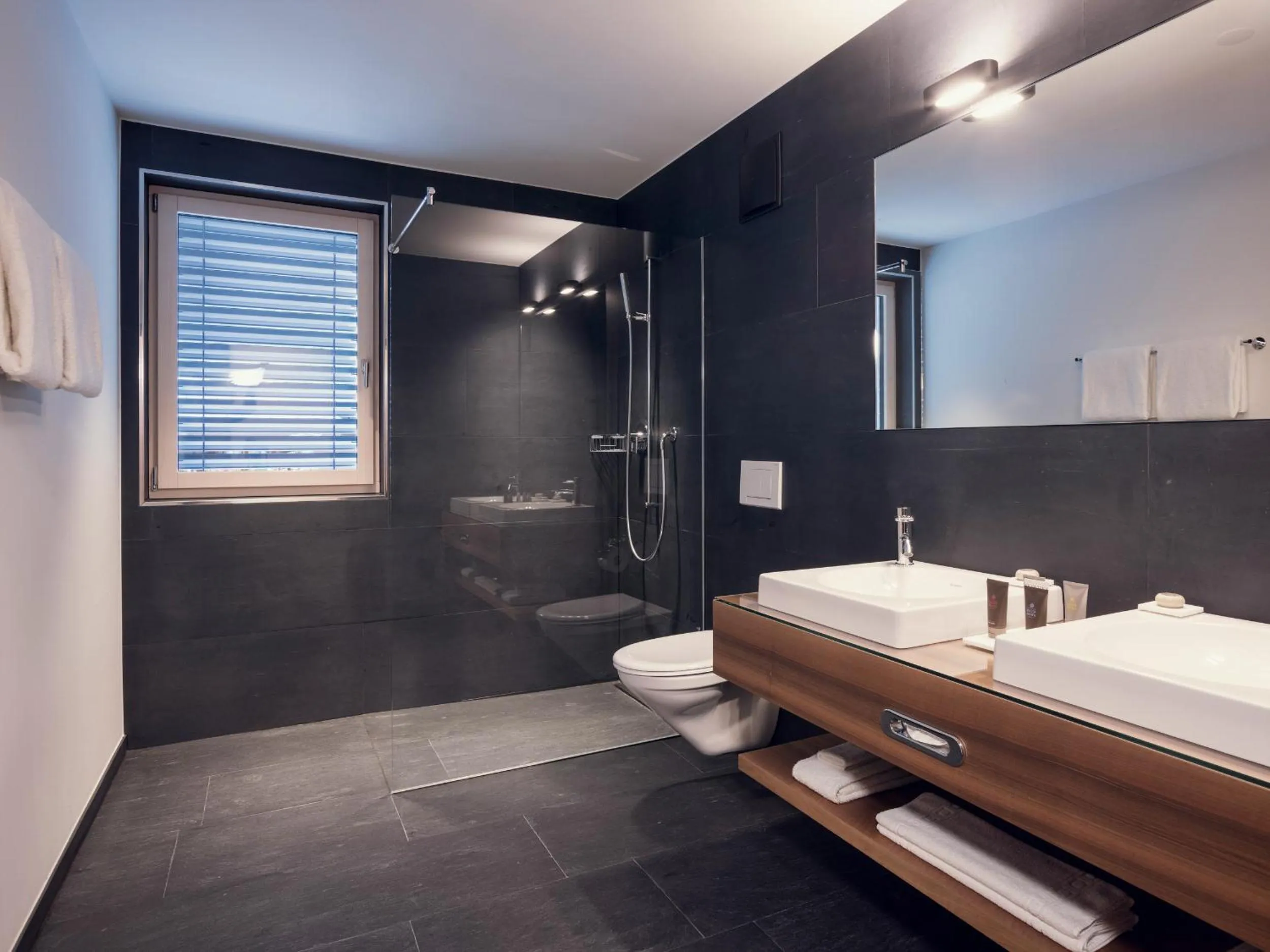 Bathroom in OVERLOOK Lodge by CERVO Zermatt
