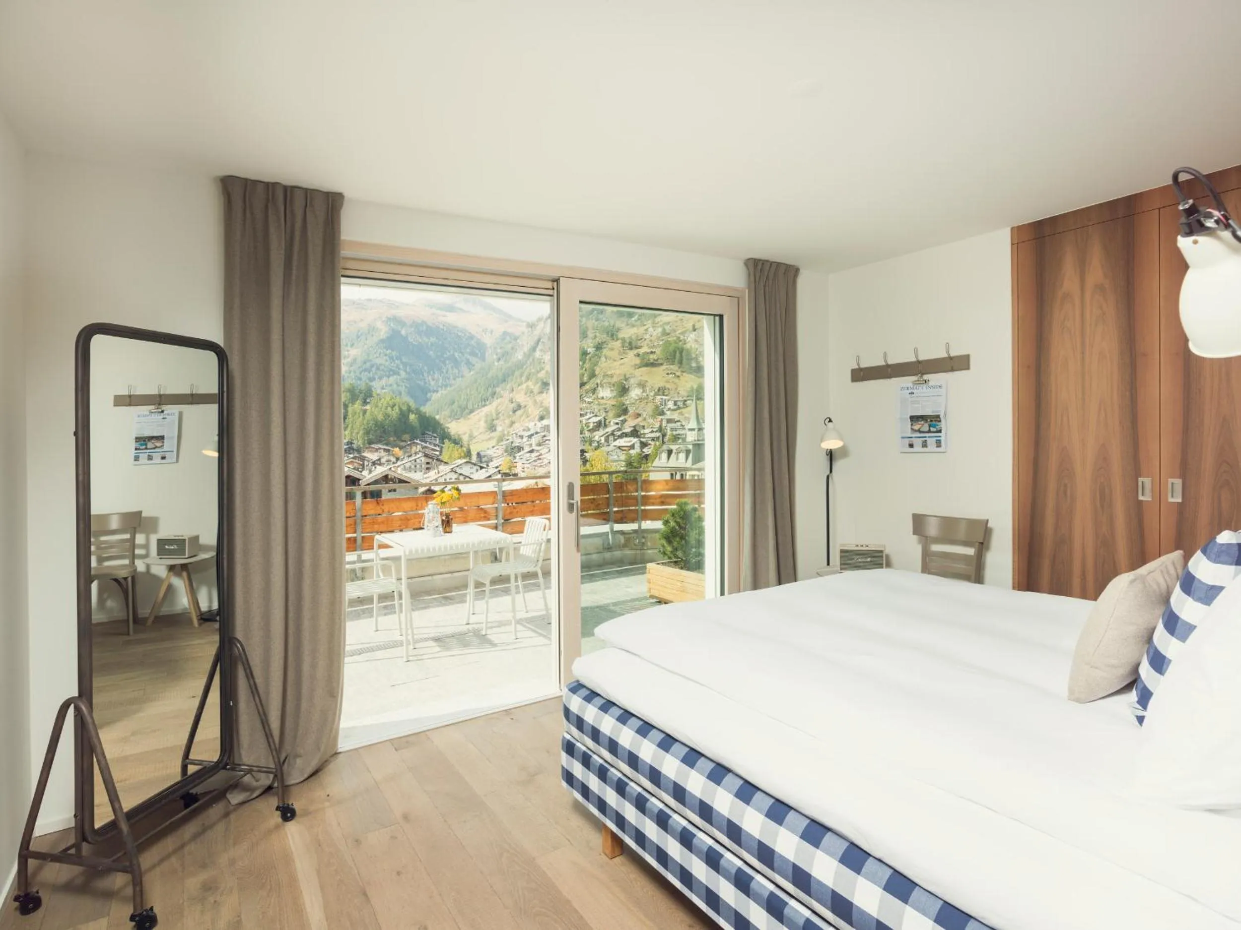 Bed in OVERLOOK Lodge by CERVO Zermatt