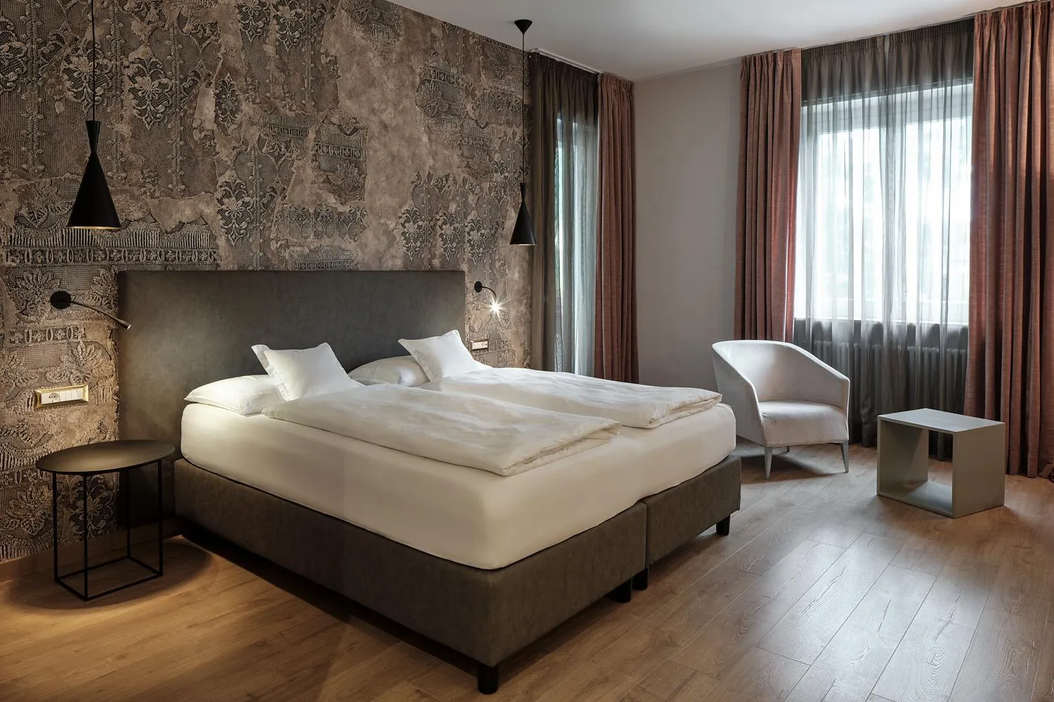 Bed in Windsor Merano Hotel & Suites