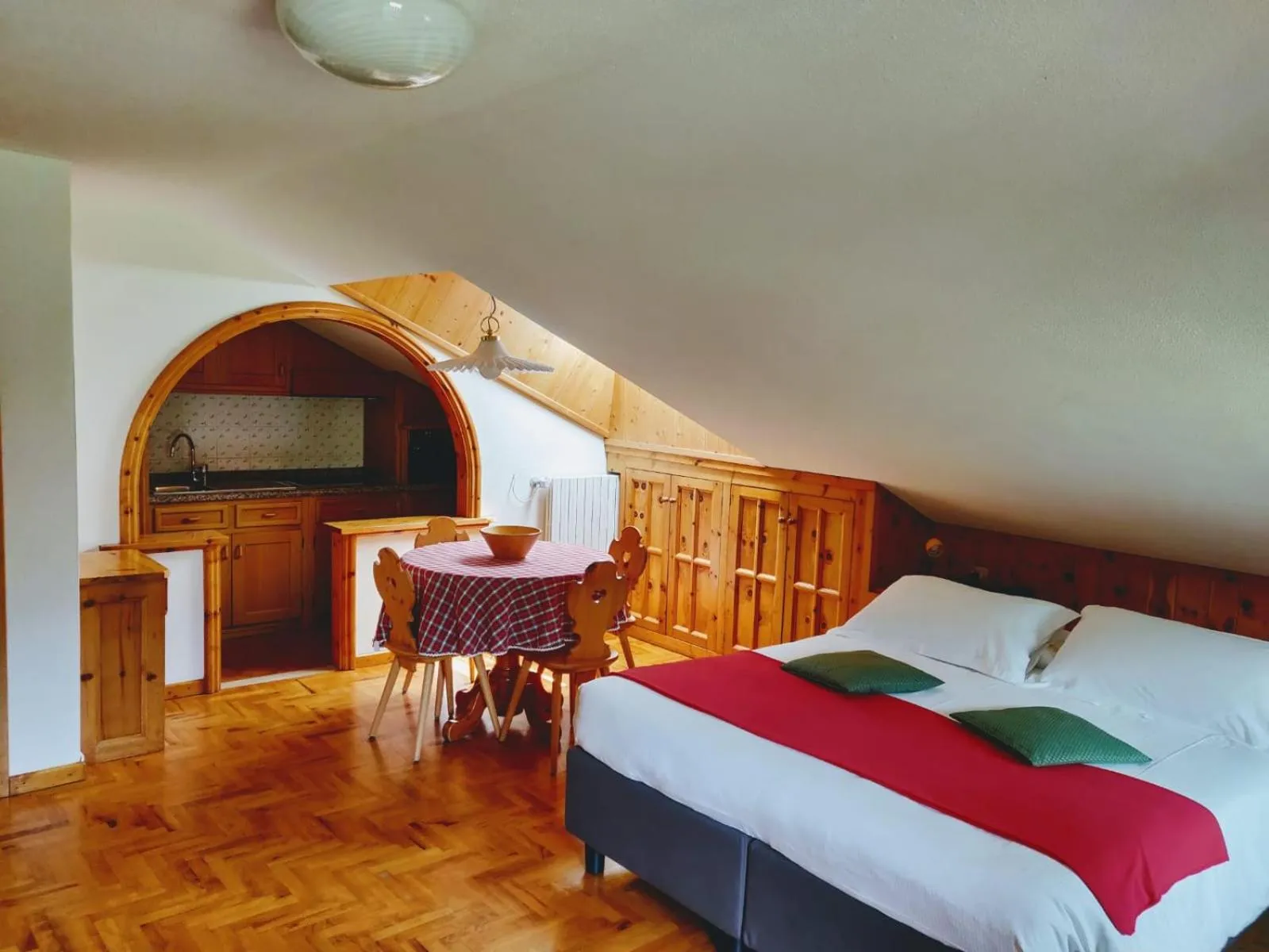 Kitchen or kitchenette, Bed in Meublè Cima Bianca Garni