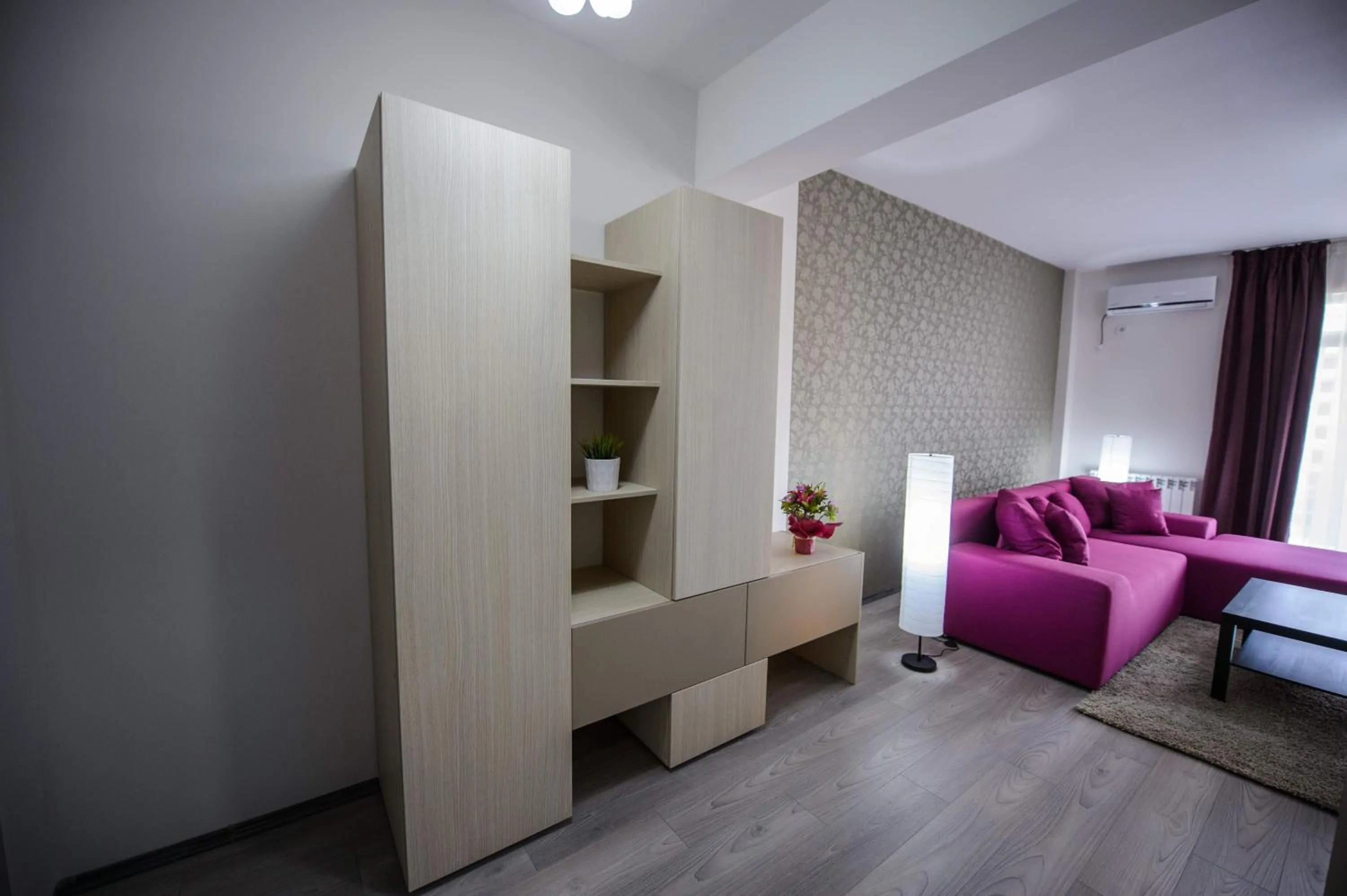 Living room, Bed in Magnum Residence