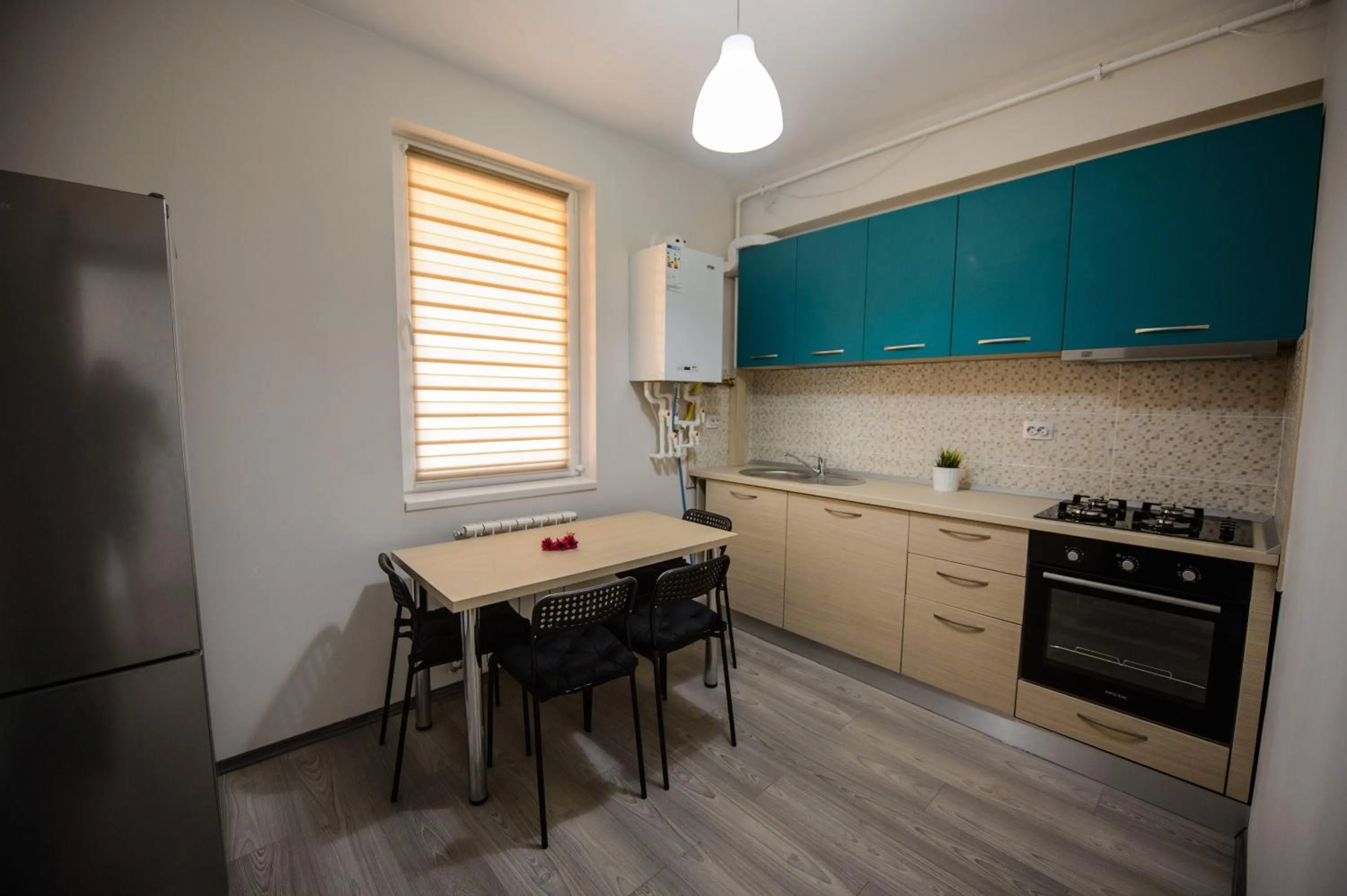 Kitchen or kitchenette in Magnum Residence