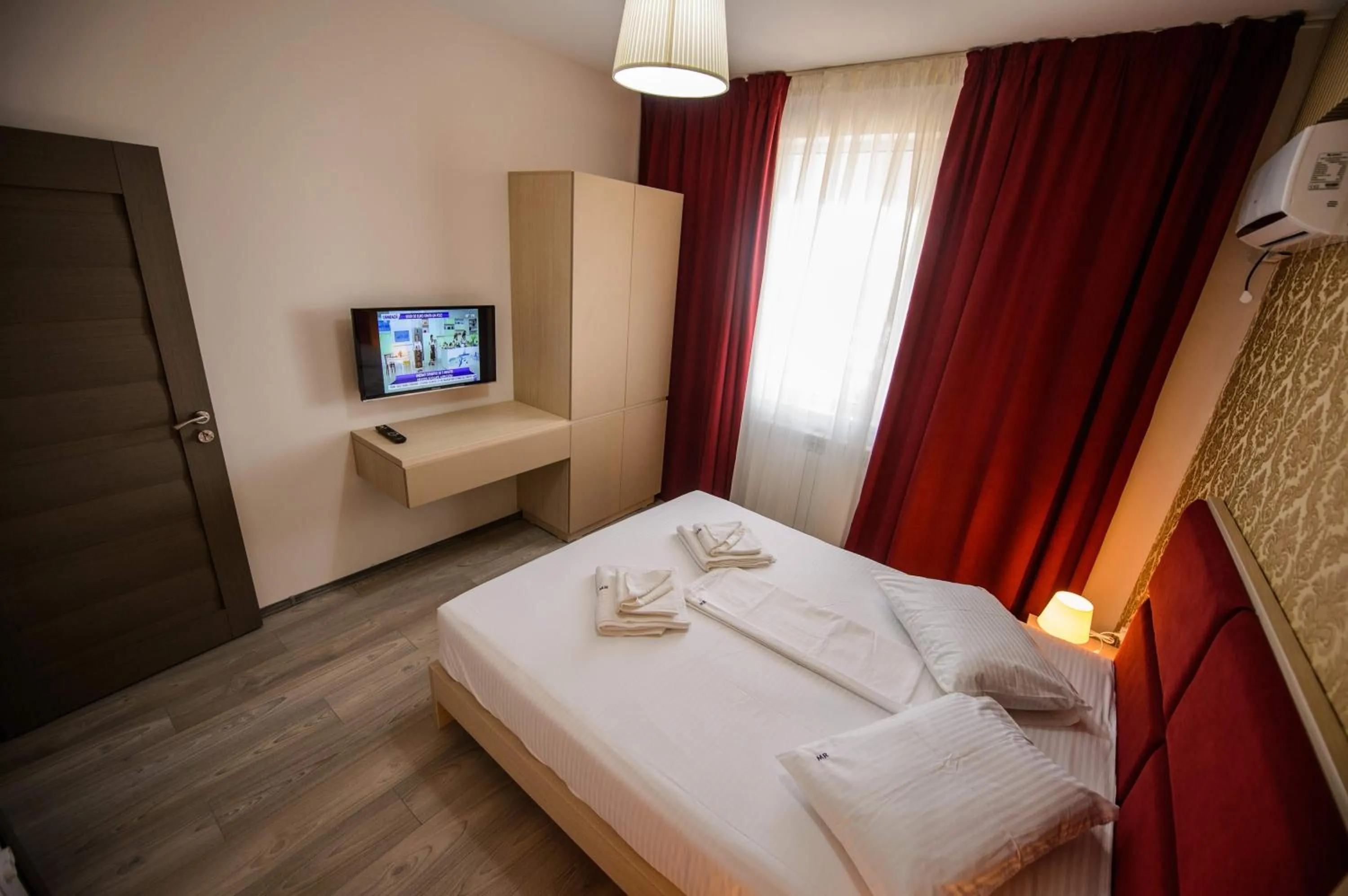 Photo of the whole room, Bed in Magnum Residence