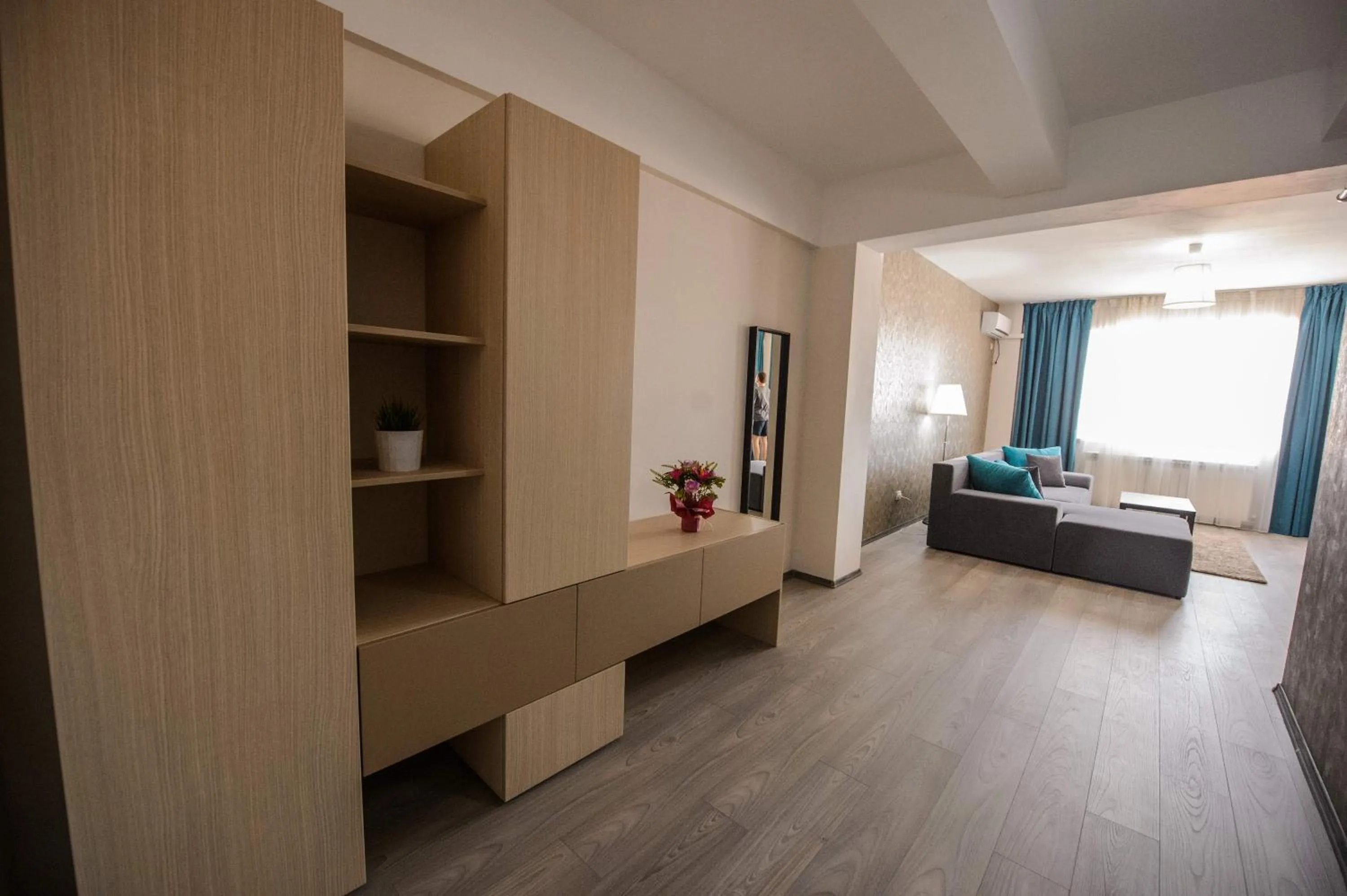 Living room, Bed in Magnum Residence