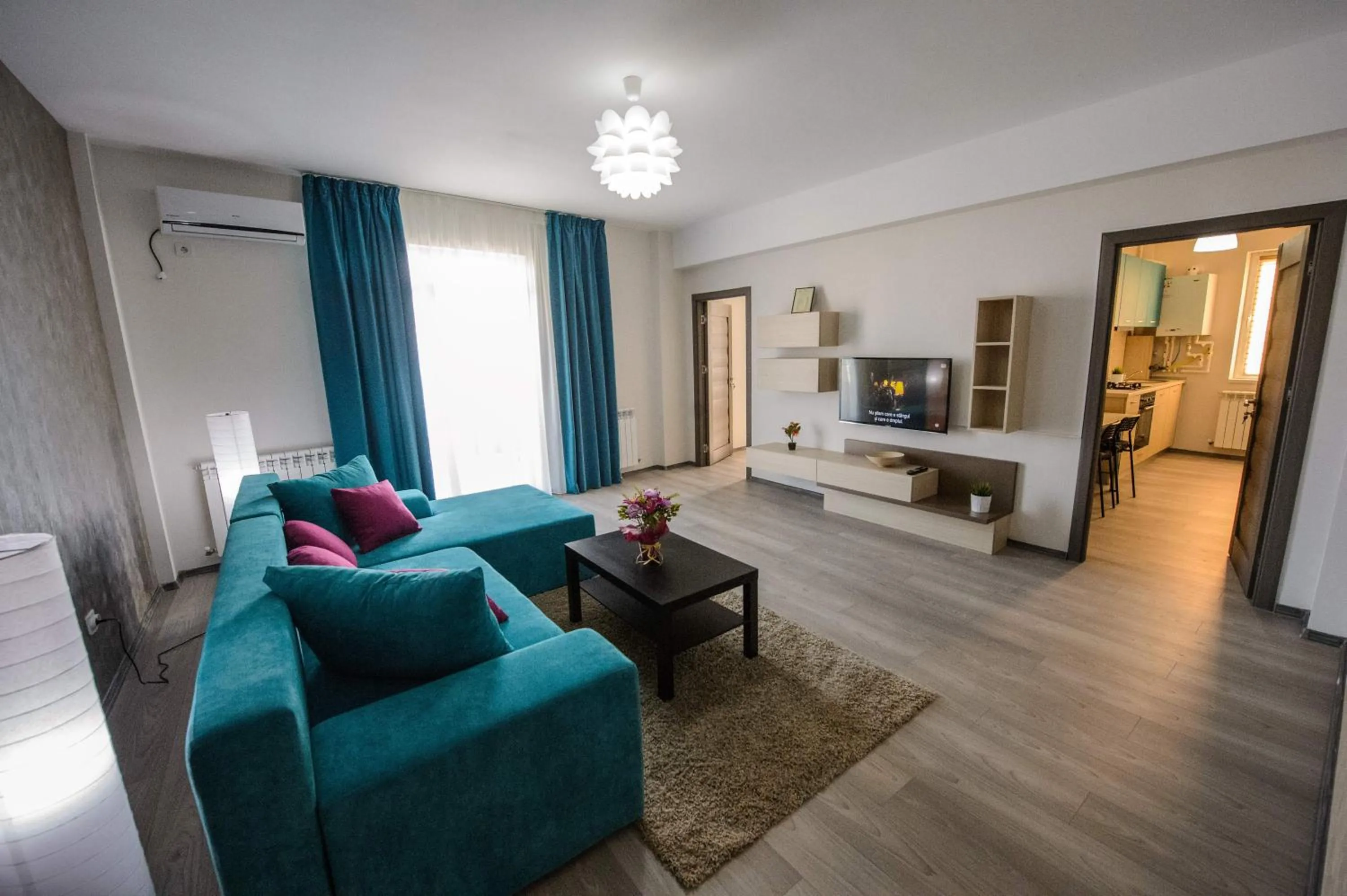 Living room, Bed in Magnum Residence