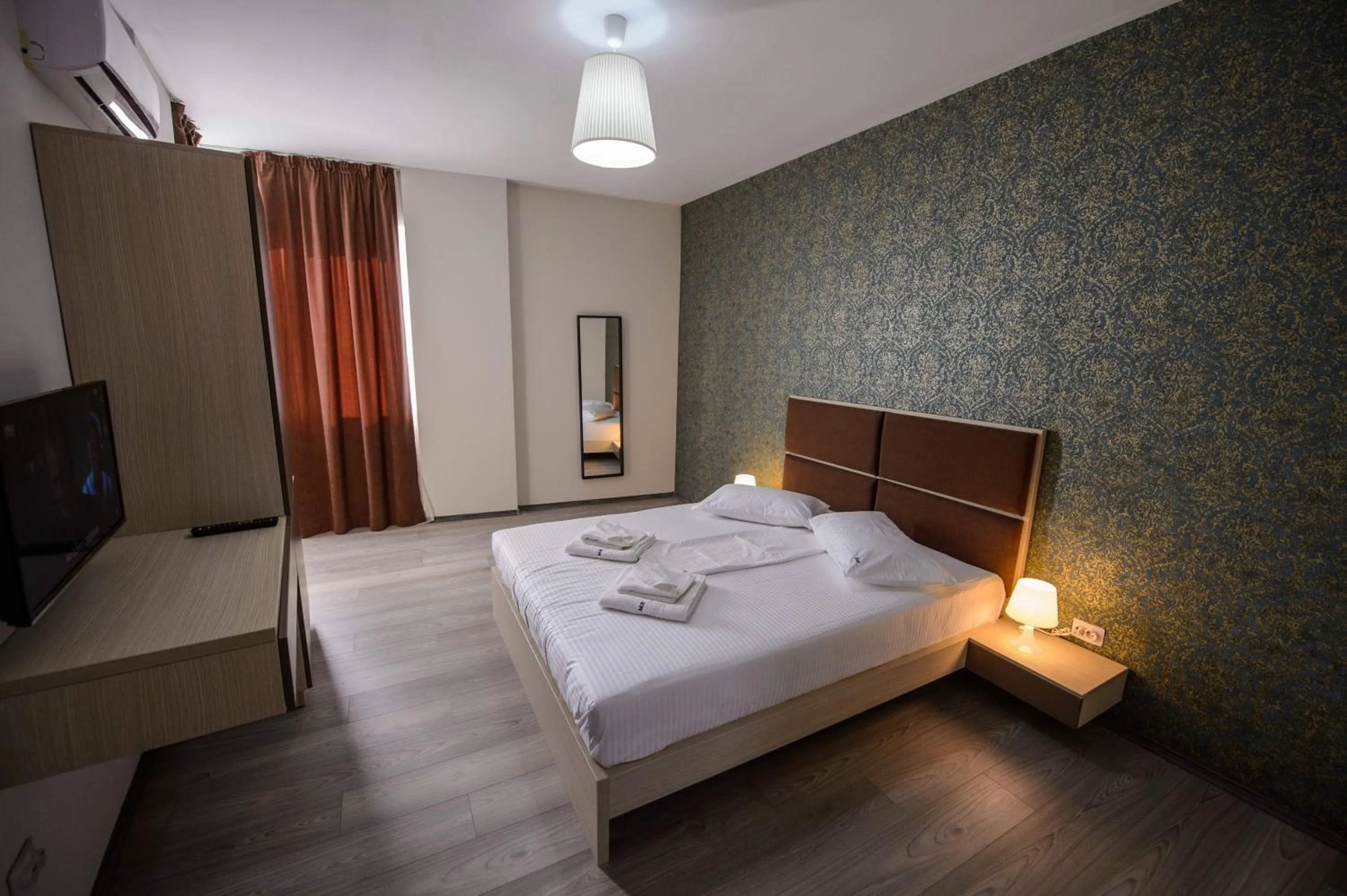 Photo of the whole room, Bed in Magnum Residence