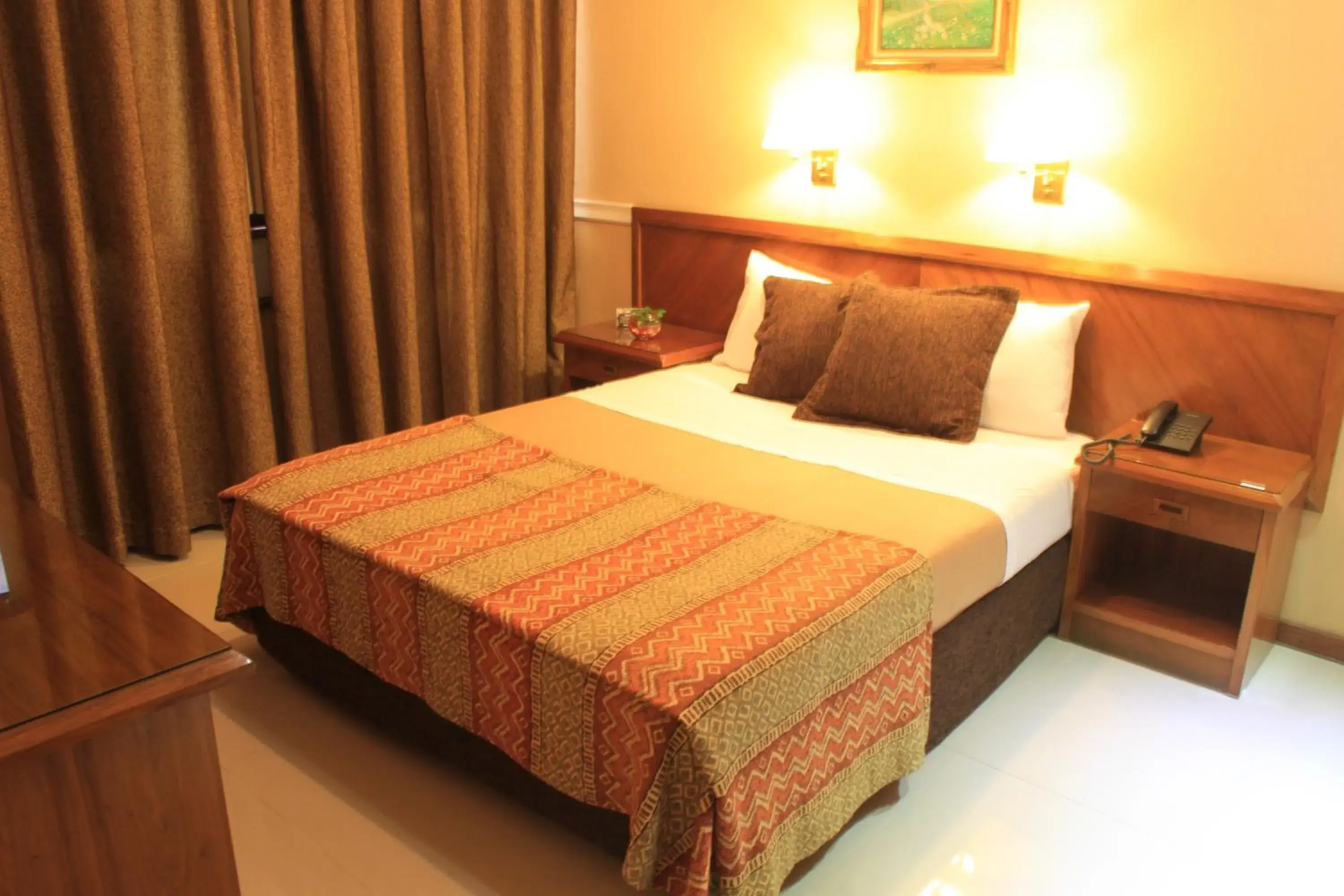 Photo of the whole room, Bed in Premier Hill Suites Hotel Photo of the whole room, Bed in Premier Hill Suites Hotel