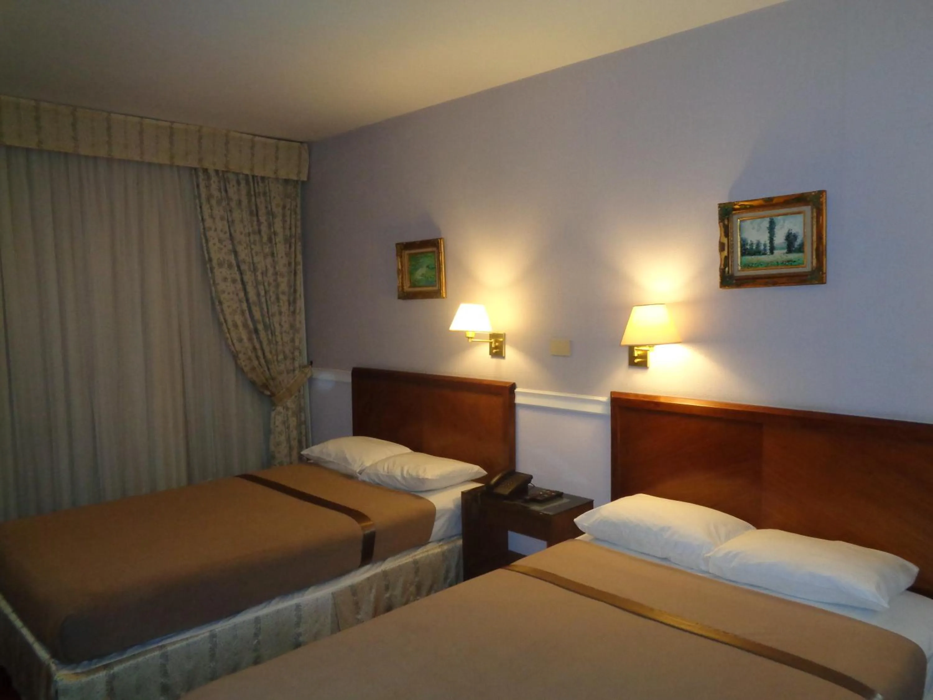 Photo of the whole room, Bed in Premier Hill Suites Hotel