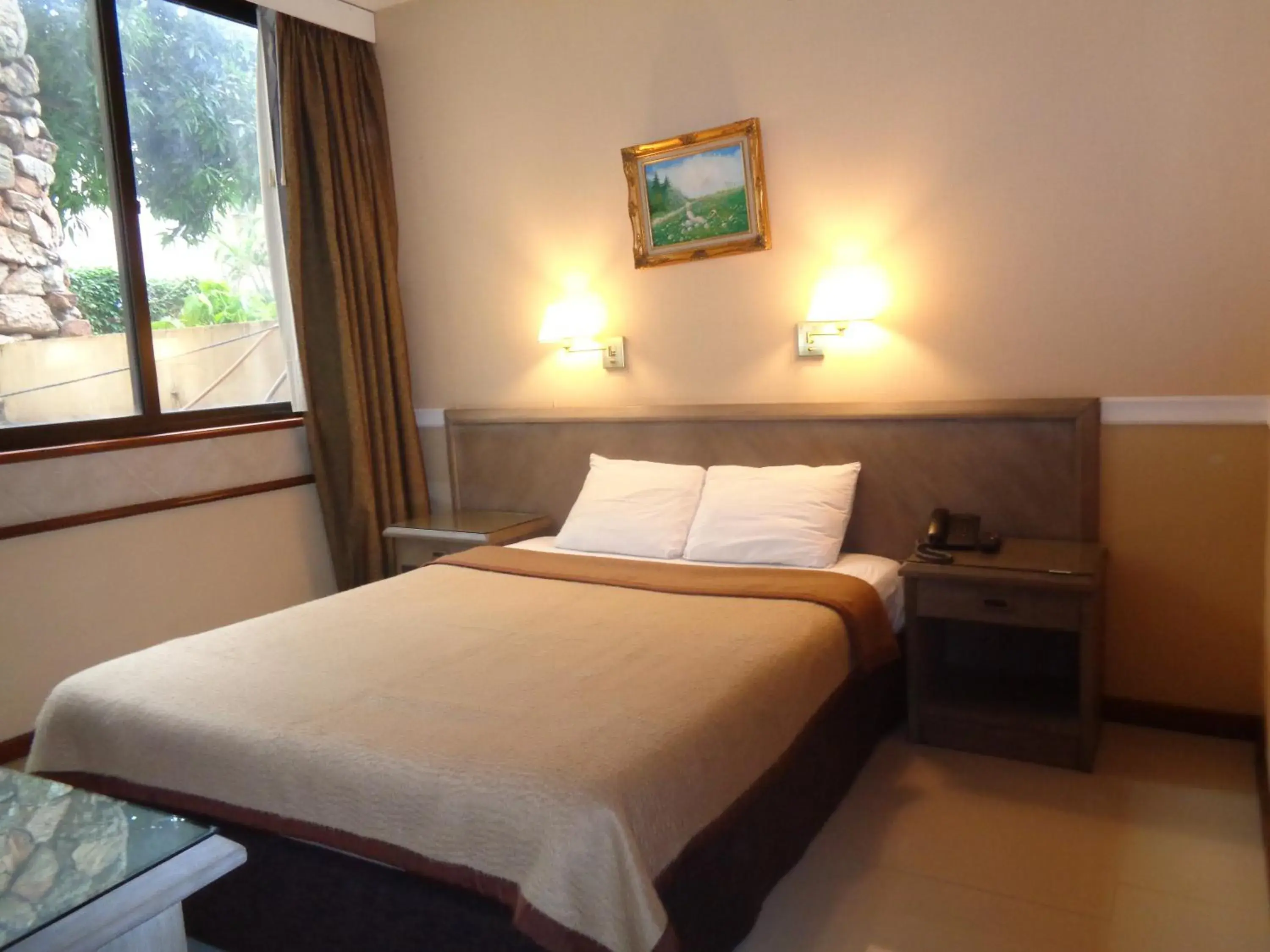 Bed in Premier Hill Suites Hotel Bed in Premier Hill Suites Hotel