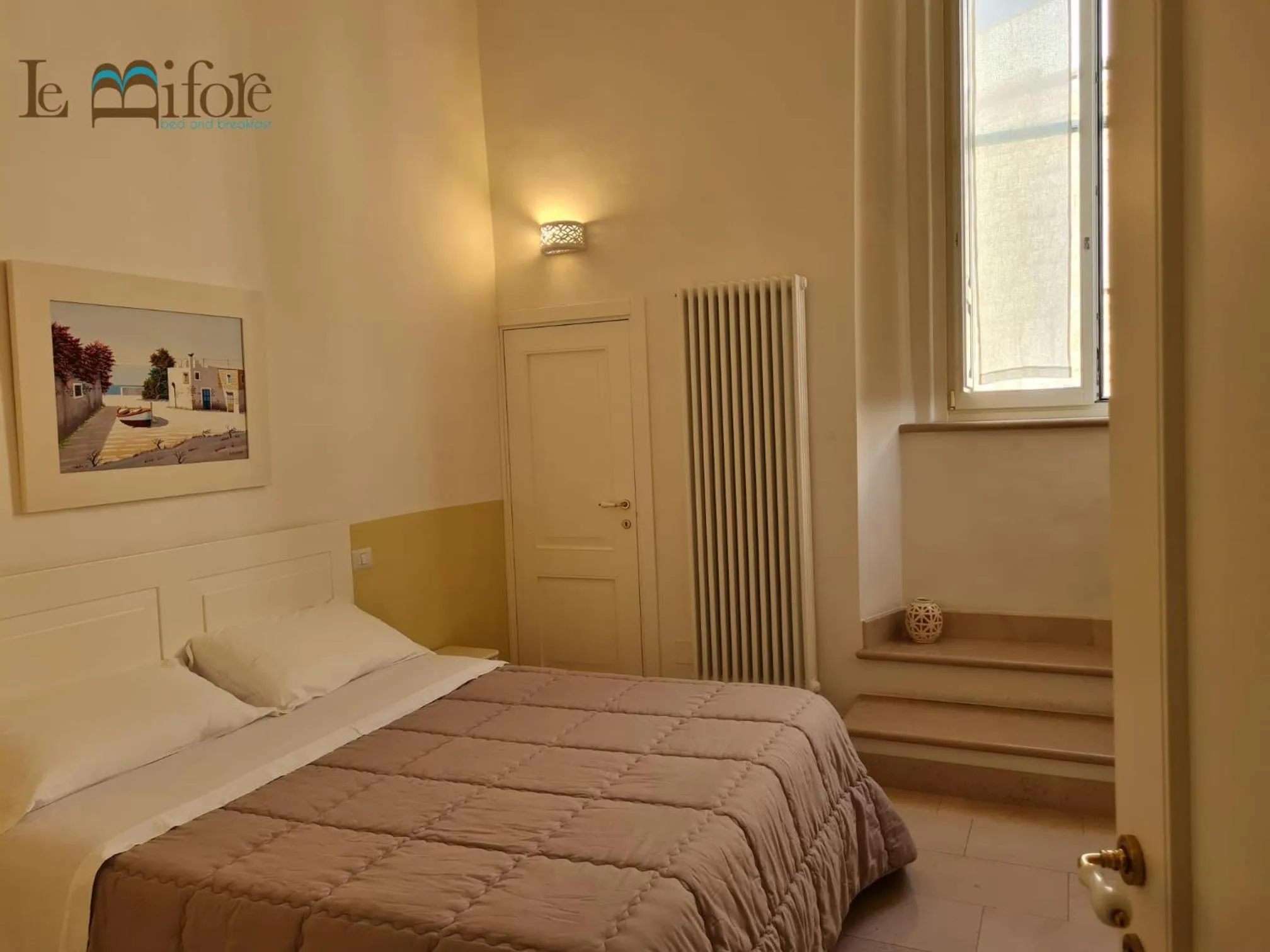 Bed in Le Bifore B&B