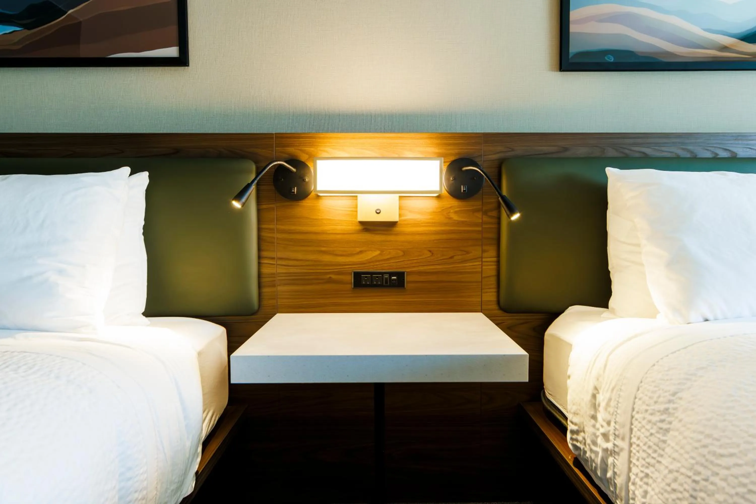 Bed in Monarch Hotel & Conference Center