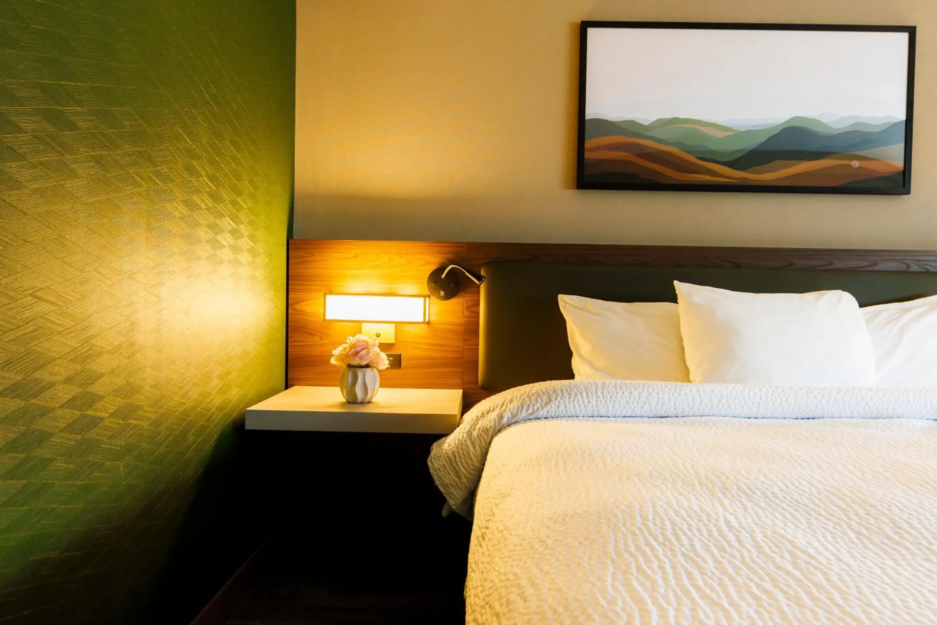 Bed in Monarch Hotel & Conference Center Bed in Monarch Hotel & Conference Center