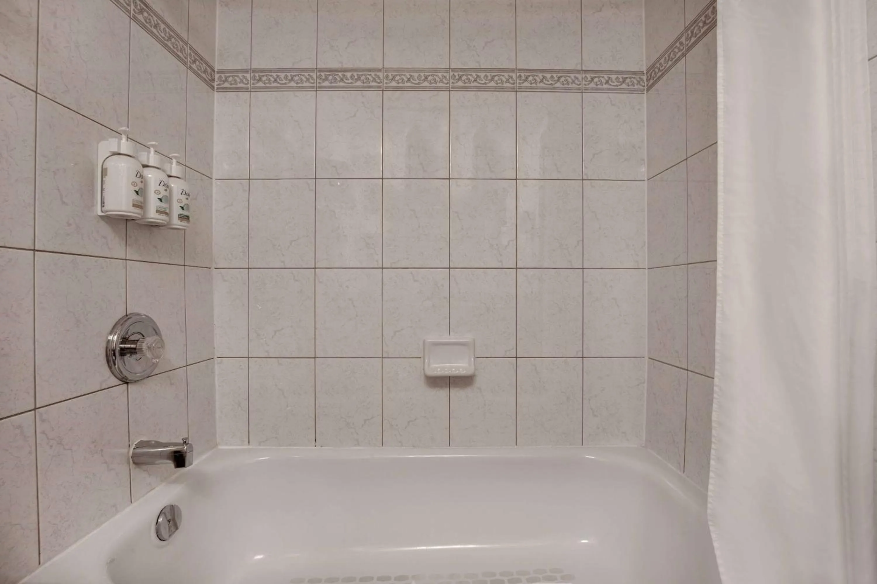 TV and multimedia in Days Inn by Wyndham Calgary South