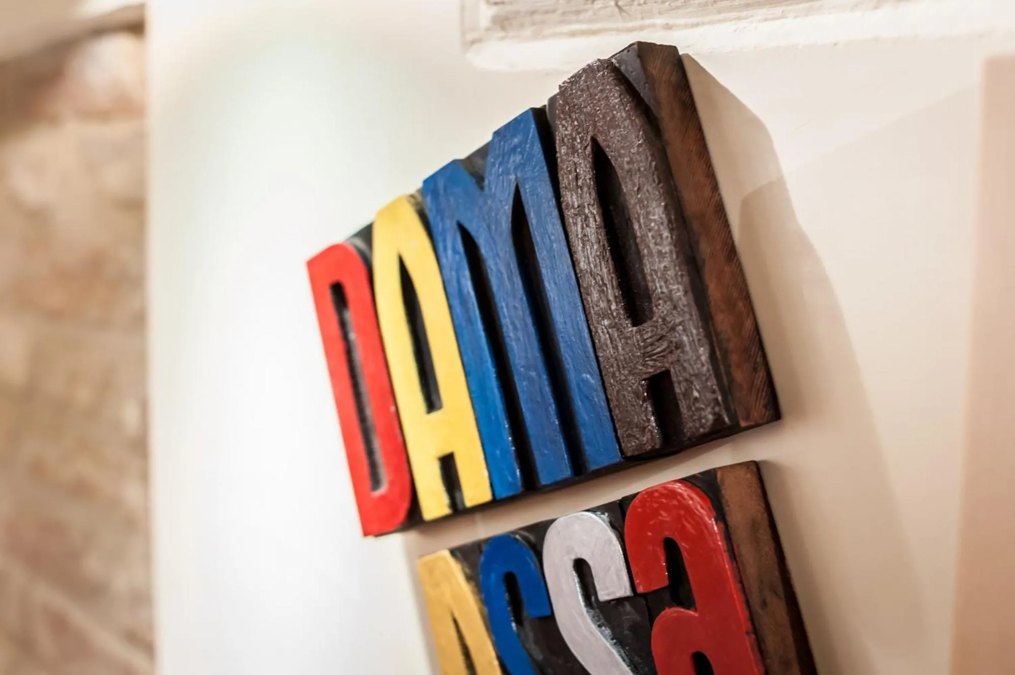 Property logo or sign in Apartments Moon or Dama