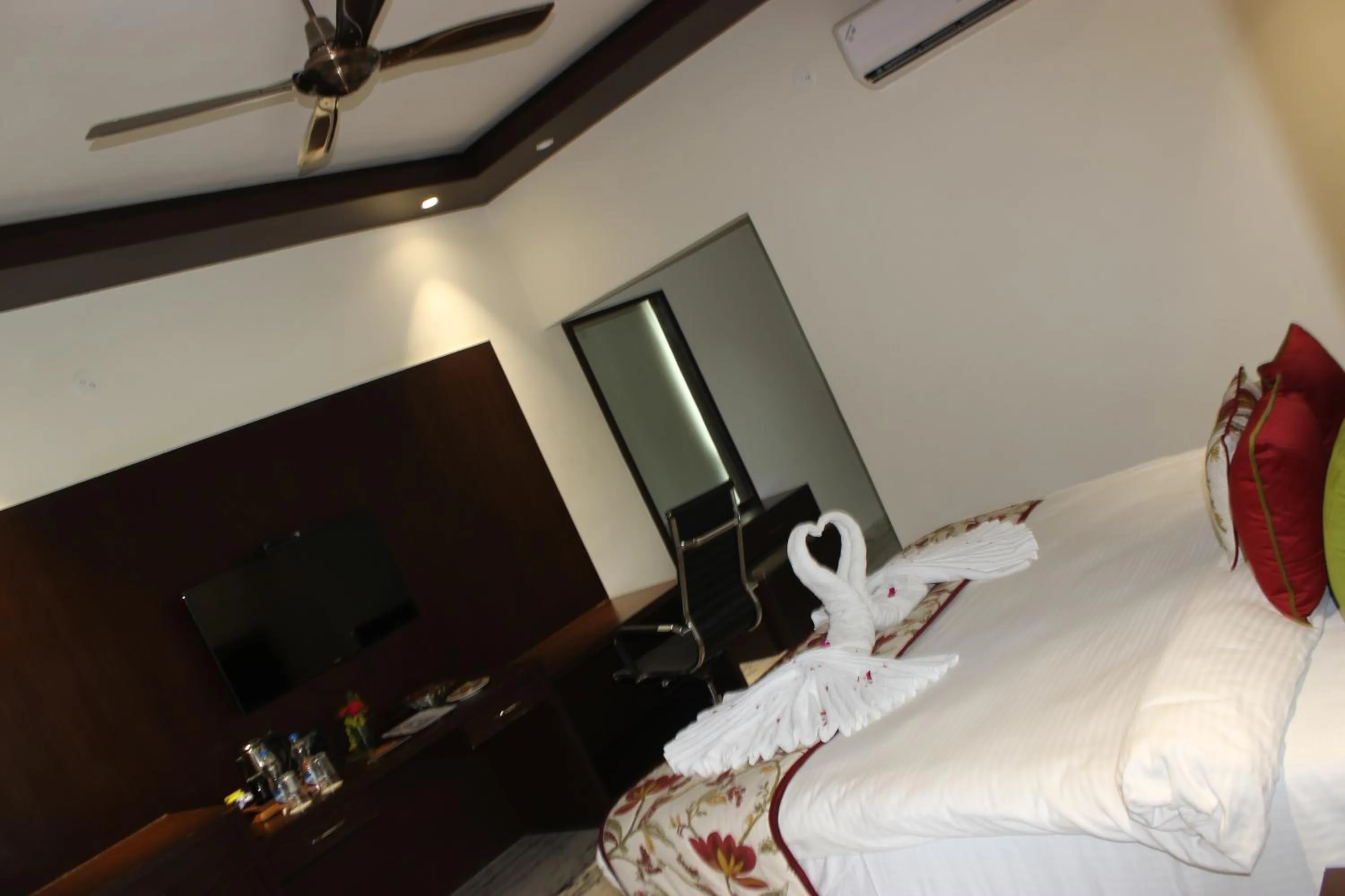 Bed in Ramya Resort & Spa