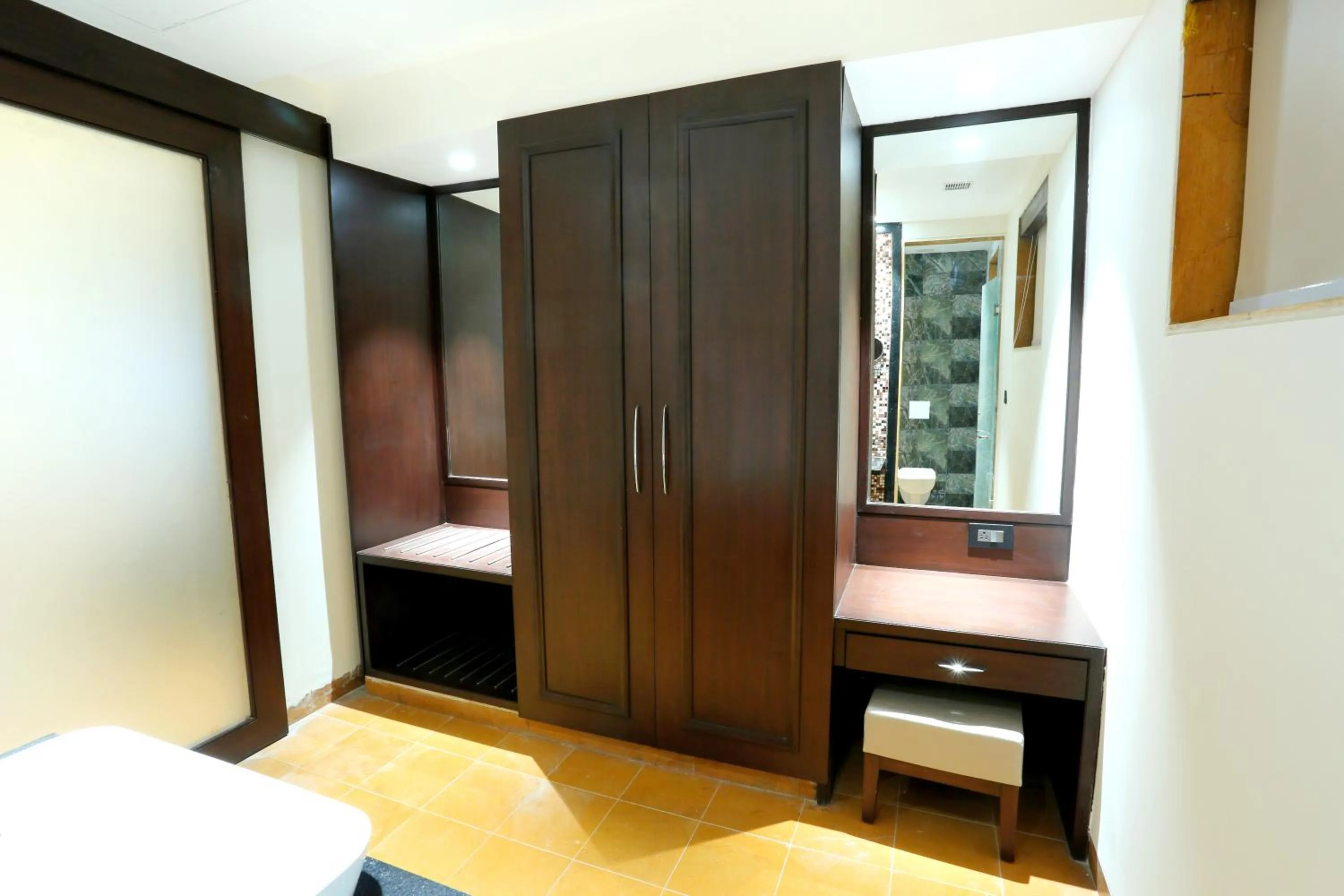 Communal lounge/ TV room, Bed in Ramya Resort & Spa