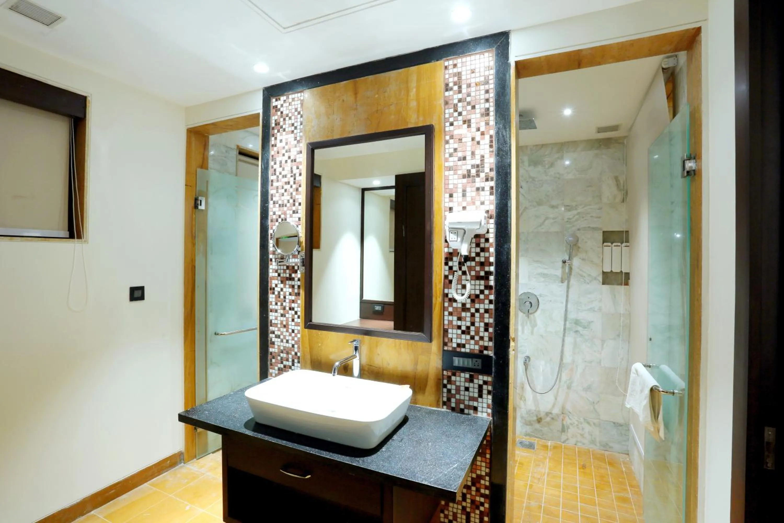 Bathroom in Ramya Resort & Spa