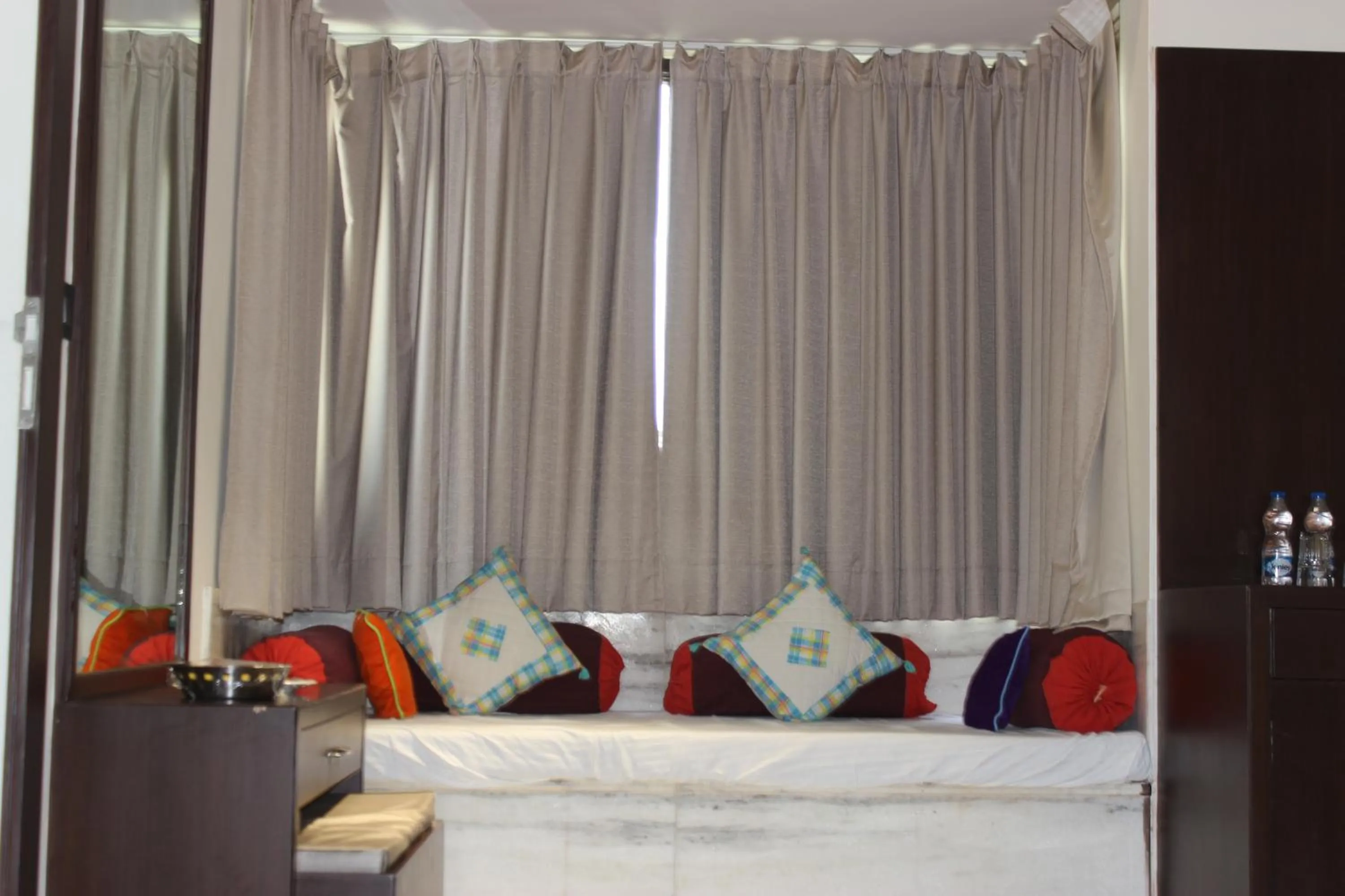 Living room, Bed in Ramya Resort & Spa