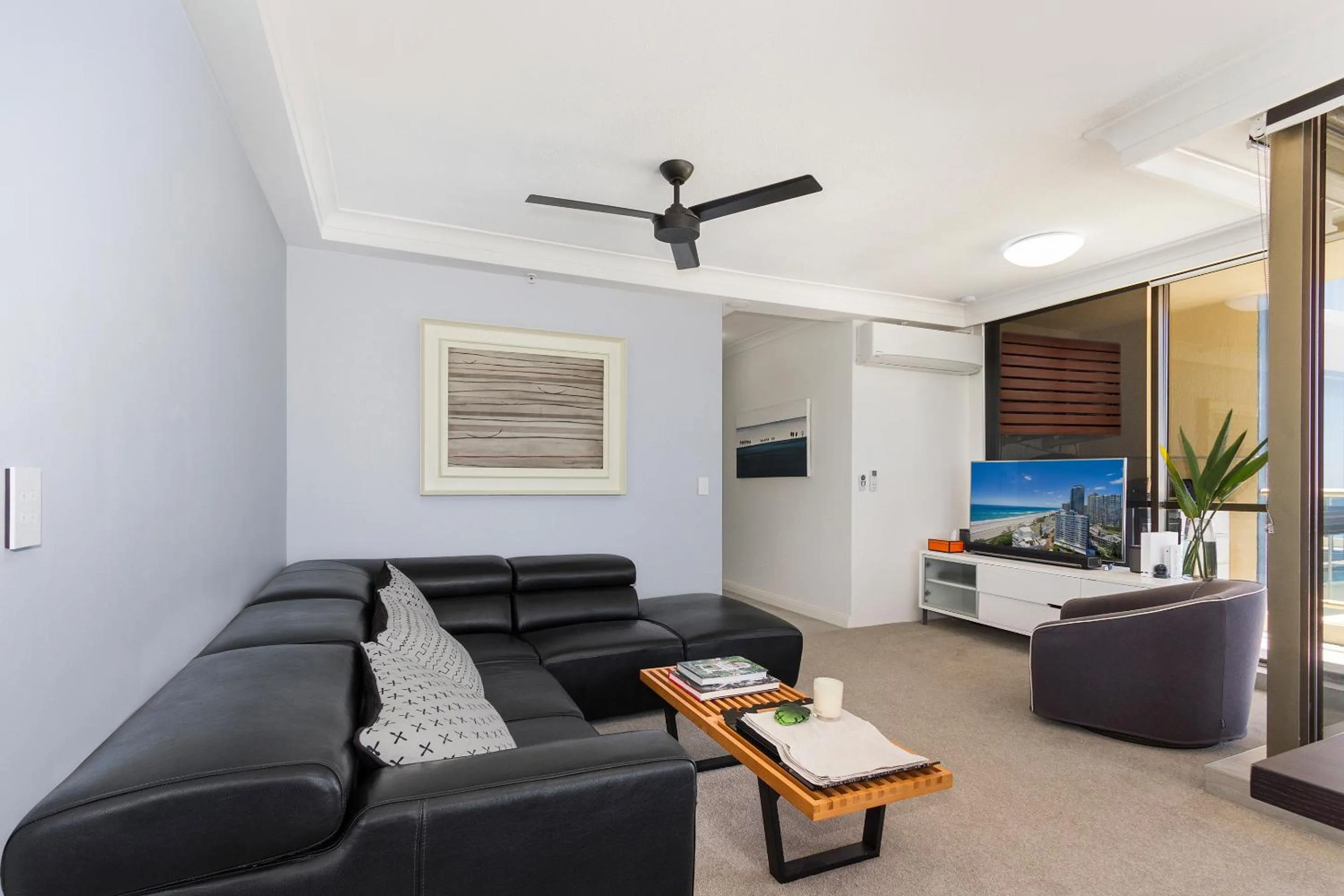 Living room in Capricorn One Beachside Holiday Apartments - Official