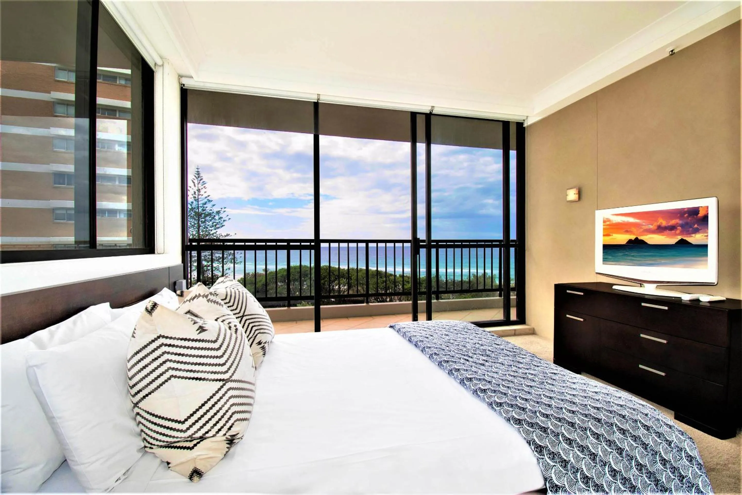 Bedroom in Capricorn One Beachside Holiday Apartments - Official