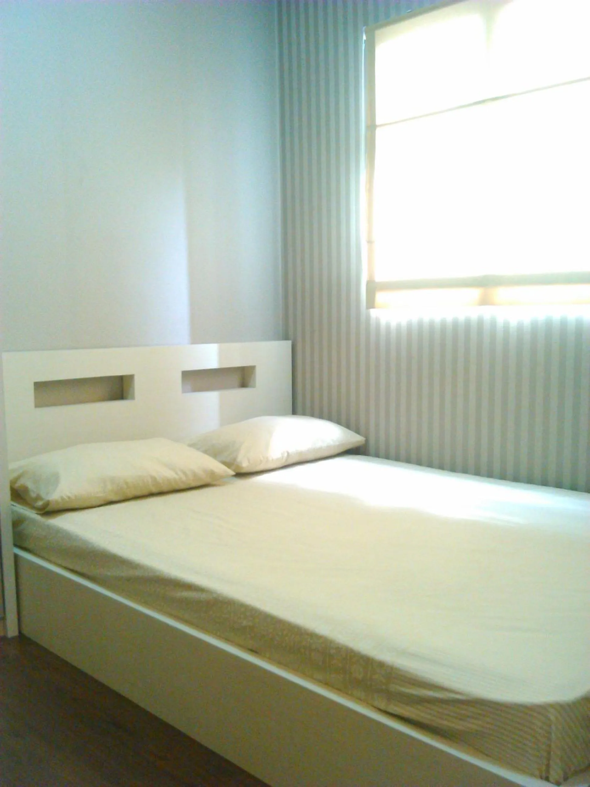 Bed in Apartment The Suites Metro by Yudis