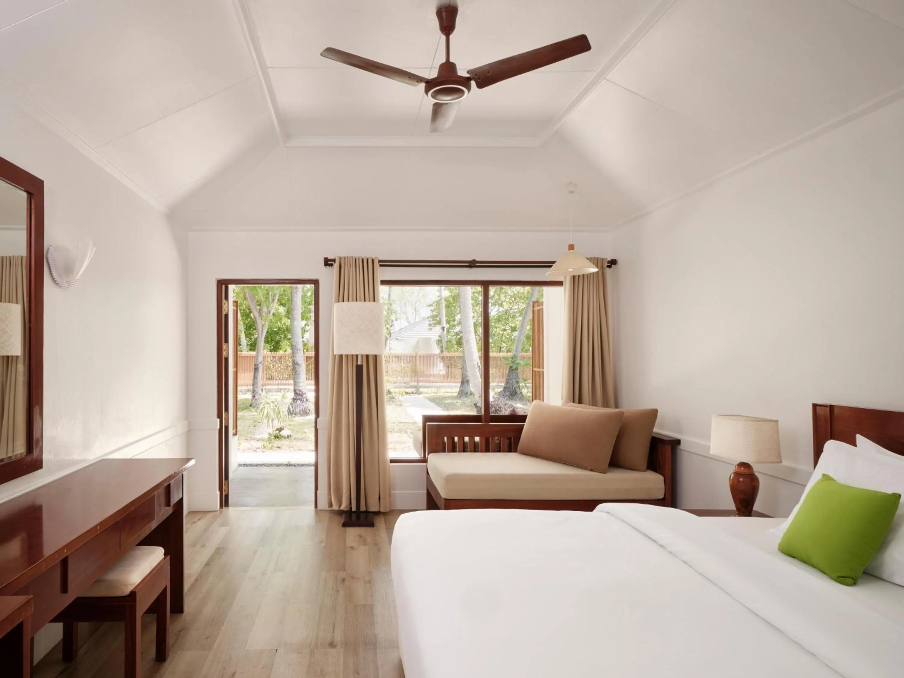 Seating area, Bed in Villa Park Sun Island Resort