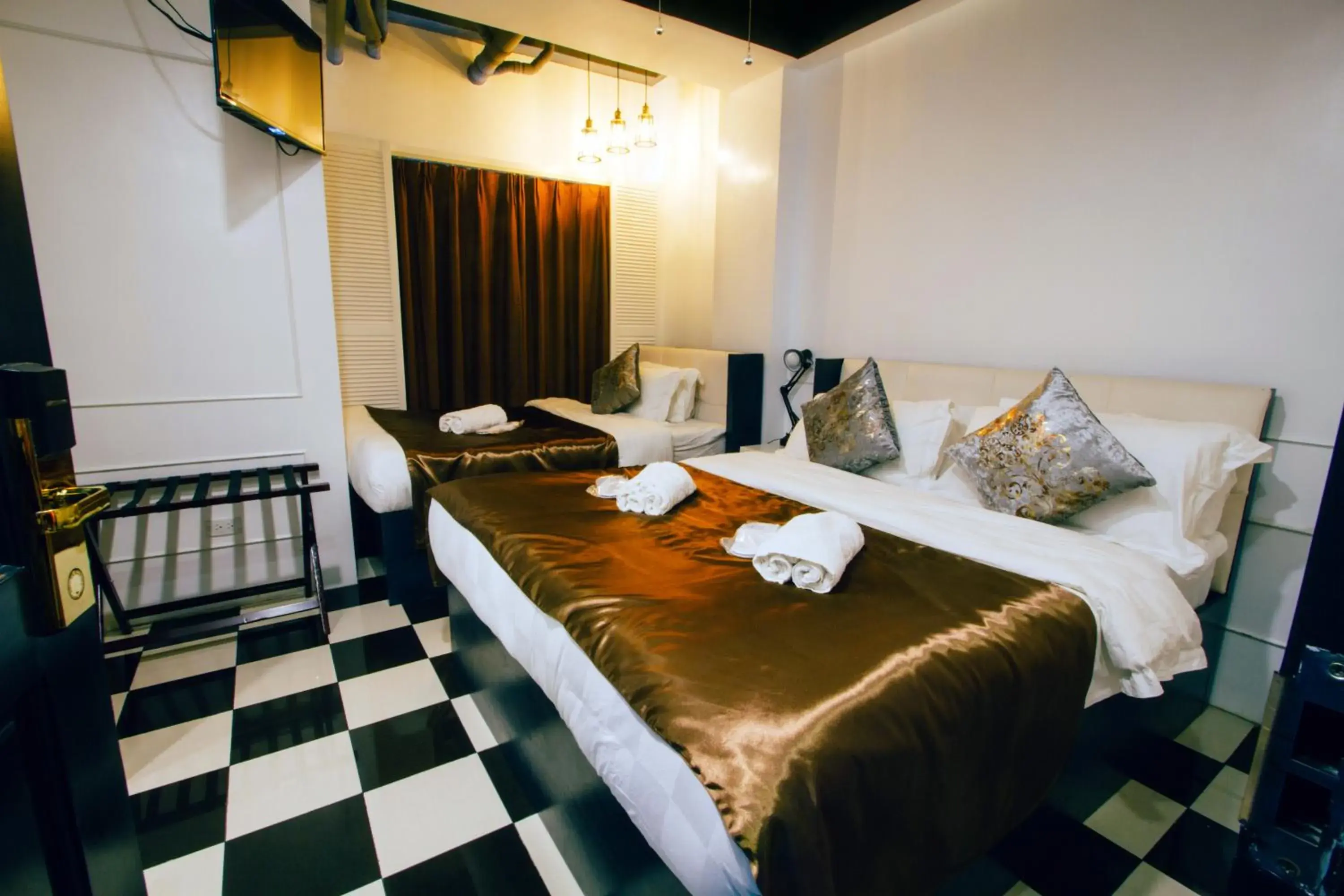 Deluxe Triple Room in Facade Hotel Deluxe Triple Room in Facade Hotel