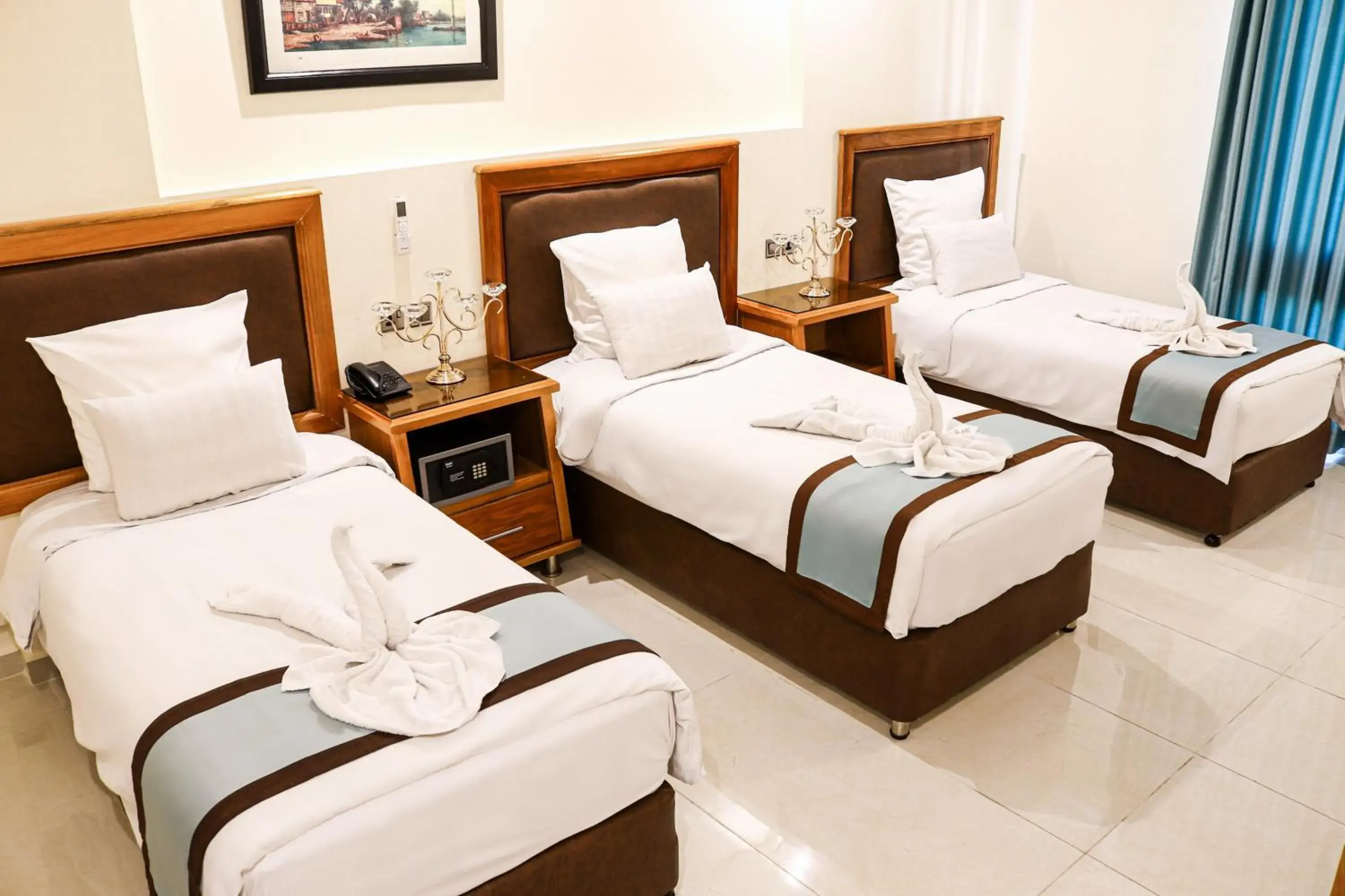 Triple Room in Al Raad Hotel Triple Room in Al Raad Hotel