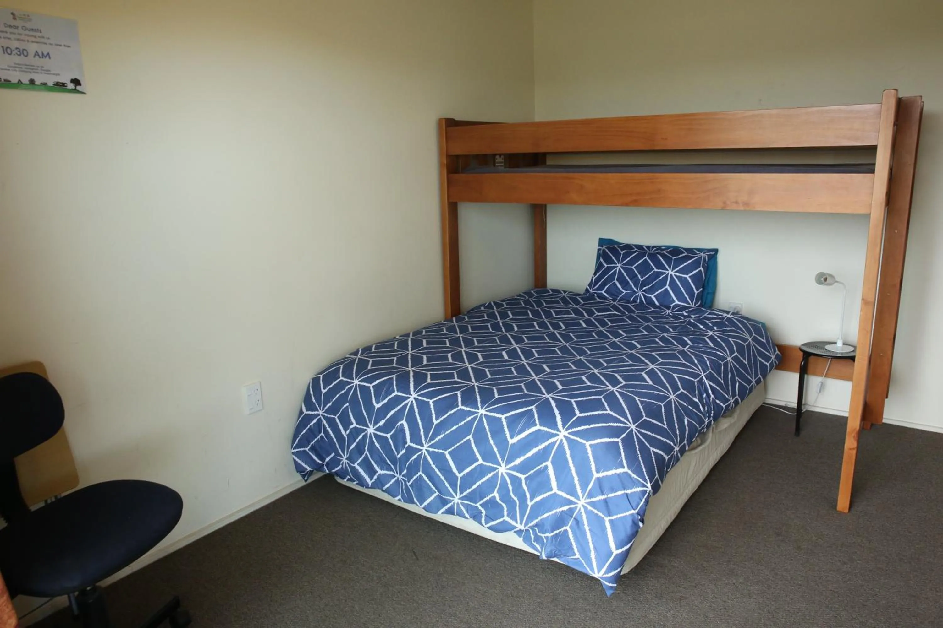 Communal lounge/ TV room, Bed in Central City Camping Park