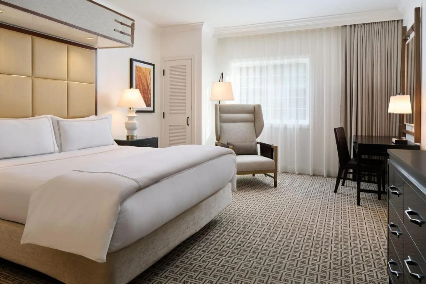 Bed in The Meritage Resort and Spa