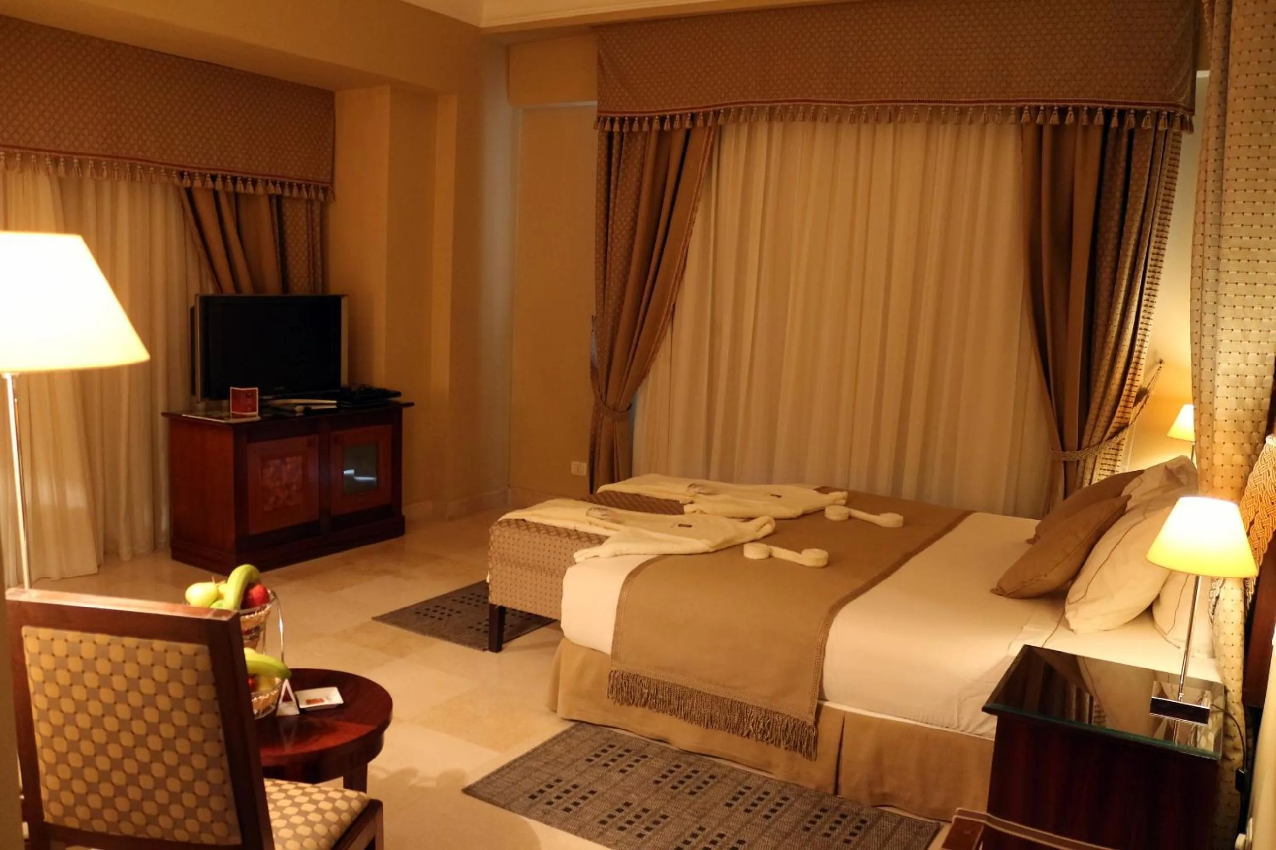 Bed in Stella Golf Hotel