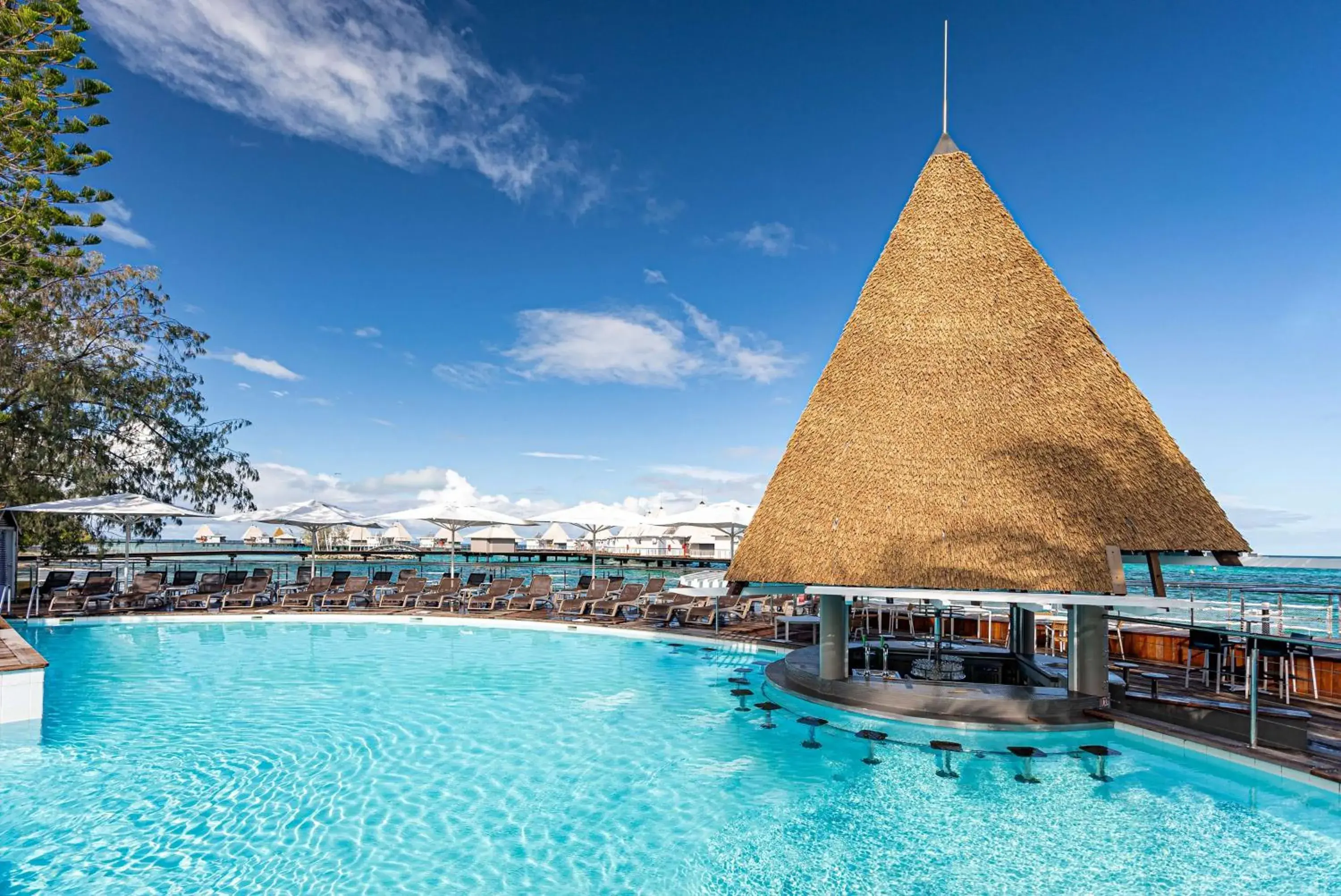 Pool view in DoubleTree by Hilton Noumea Ilot Maitre Resort Pool view in DoubleTree by Hilton Noumea Ilot Maitre Resort