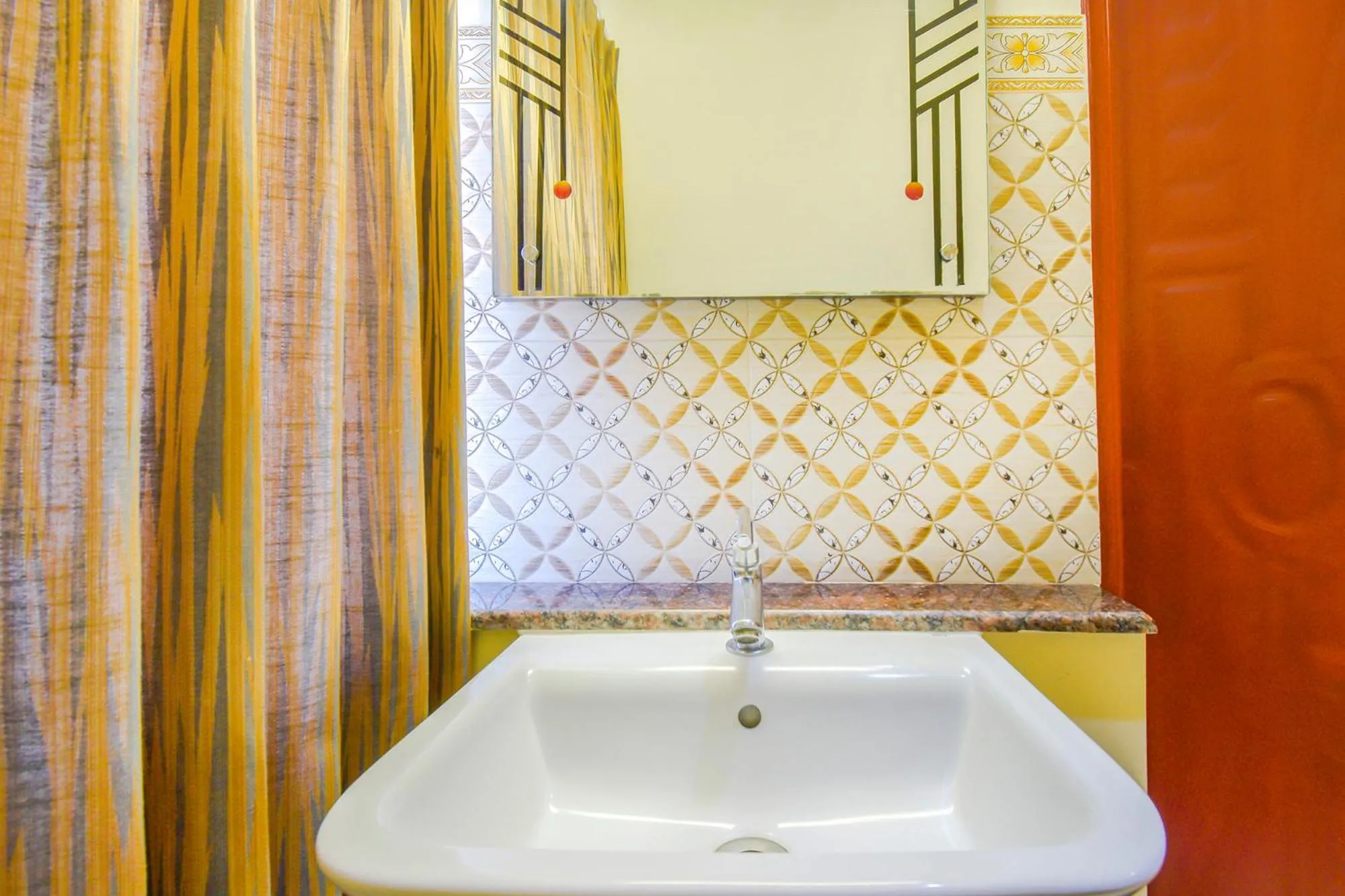 Bathroom in Thaneegai Residency