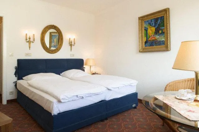 Bed in Hotel Behrmann