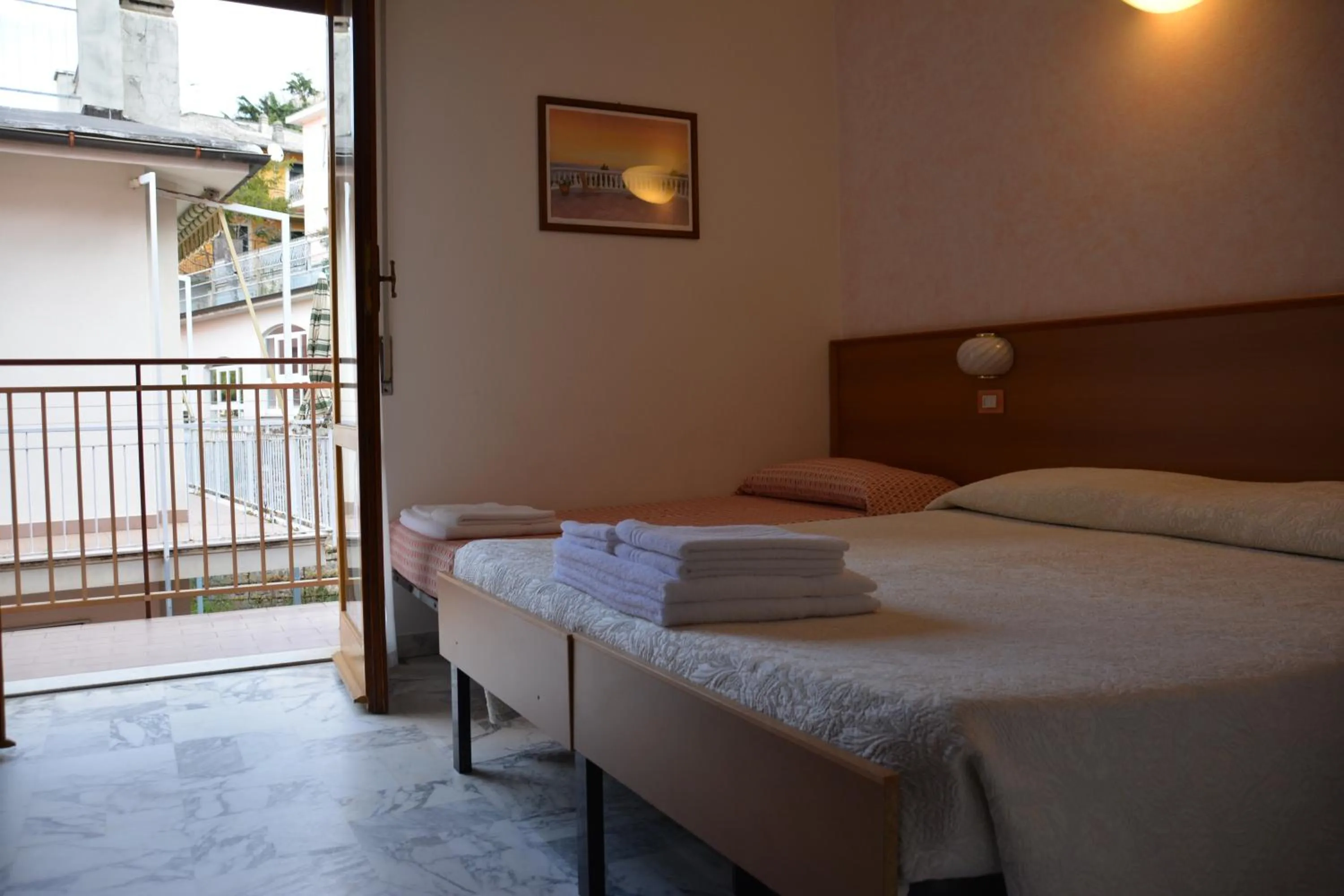 Bed in Hotel Corallo