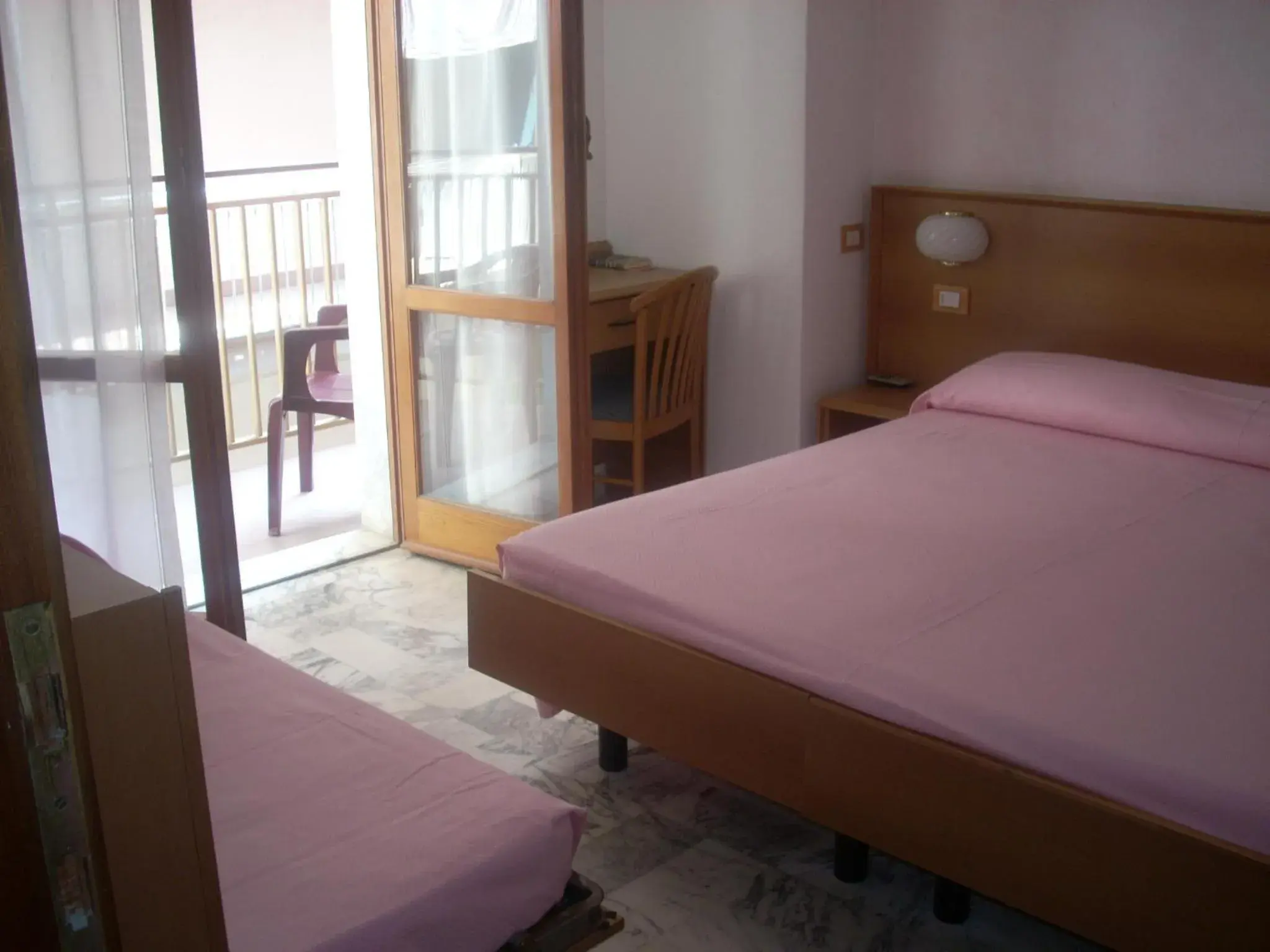 Triple Room in Hotel Corallo Triple Room in Hotel Corallo