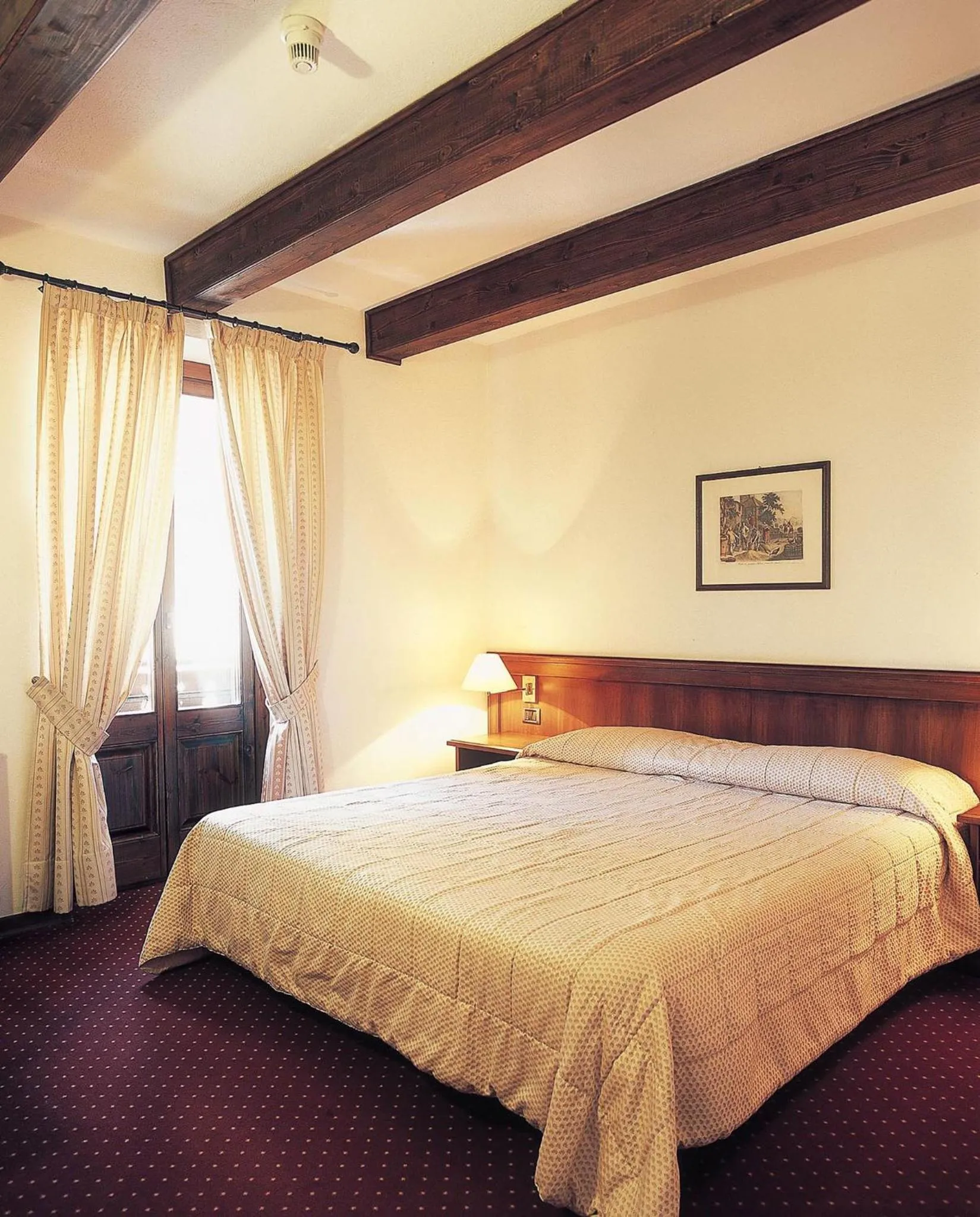 Bed in Hotel Dei Camosci