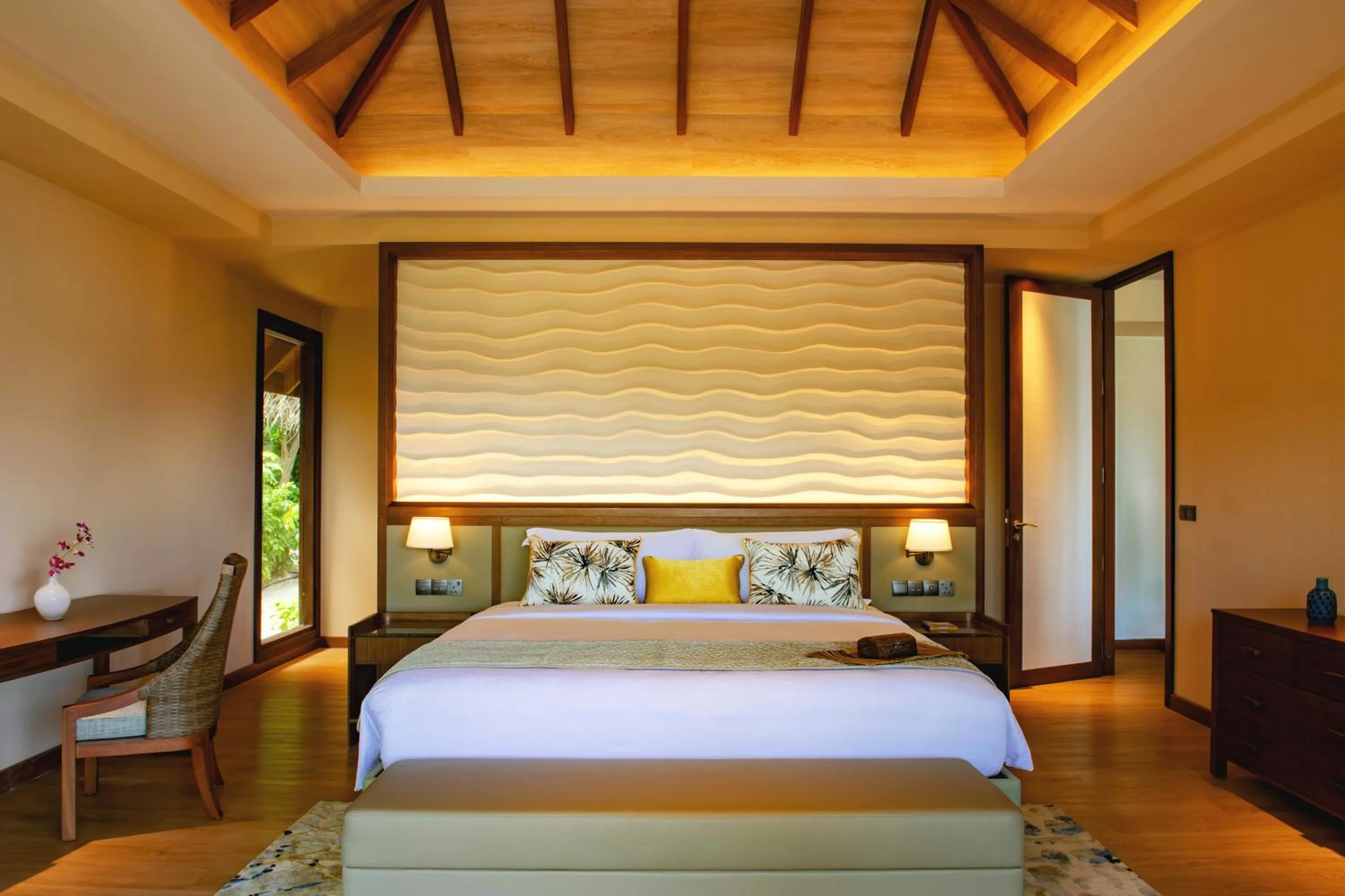 Bed in Baros Maldives