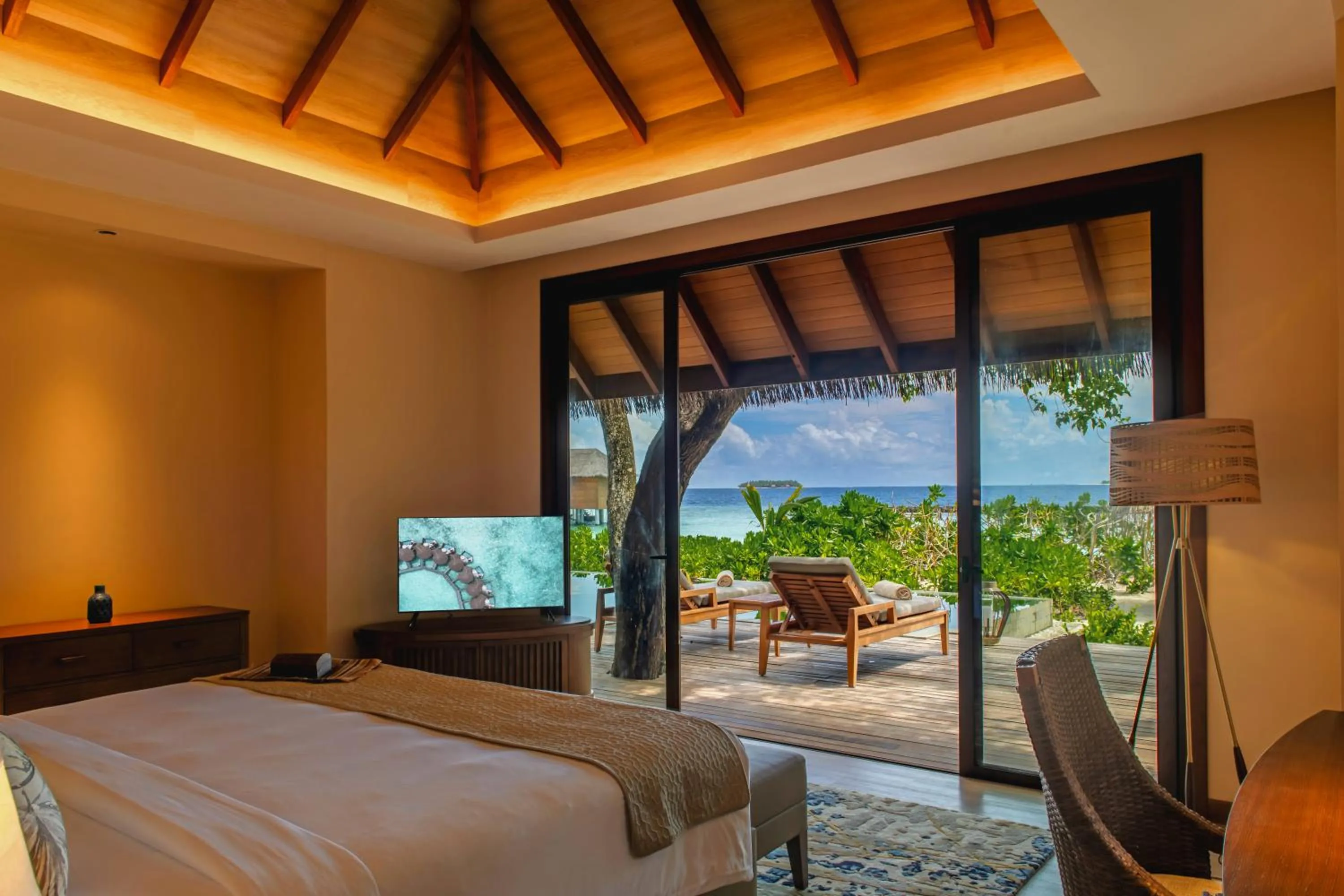 Bed in Baros Maldives