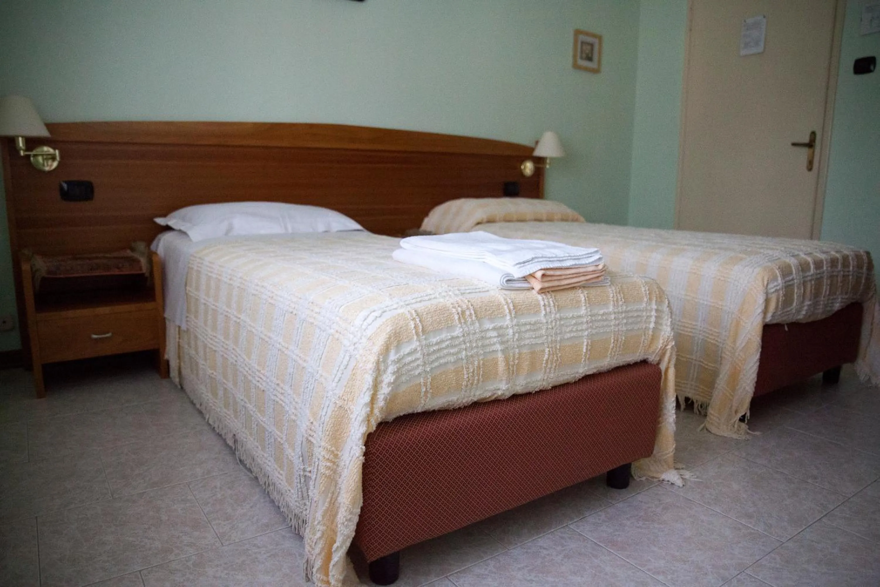 Bed in Hotel Trieste