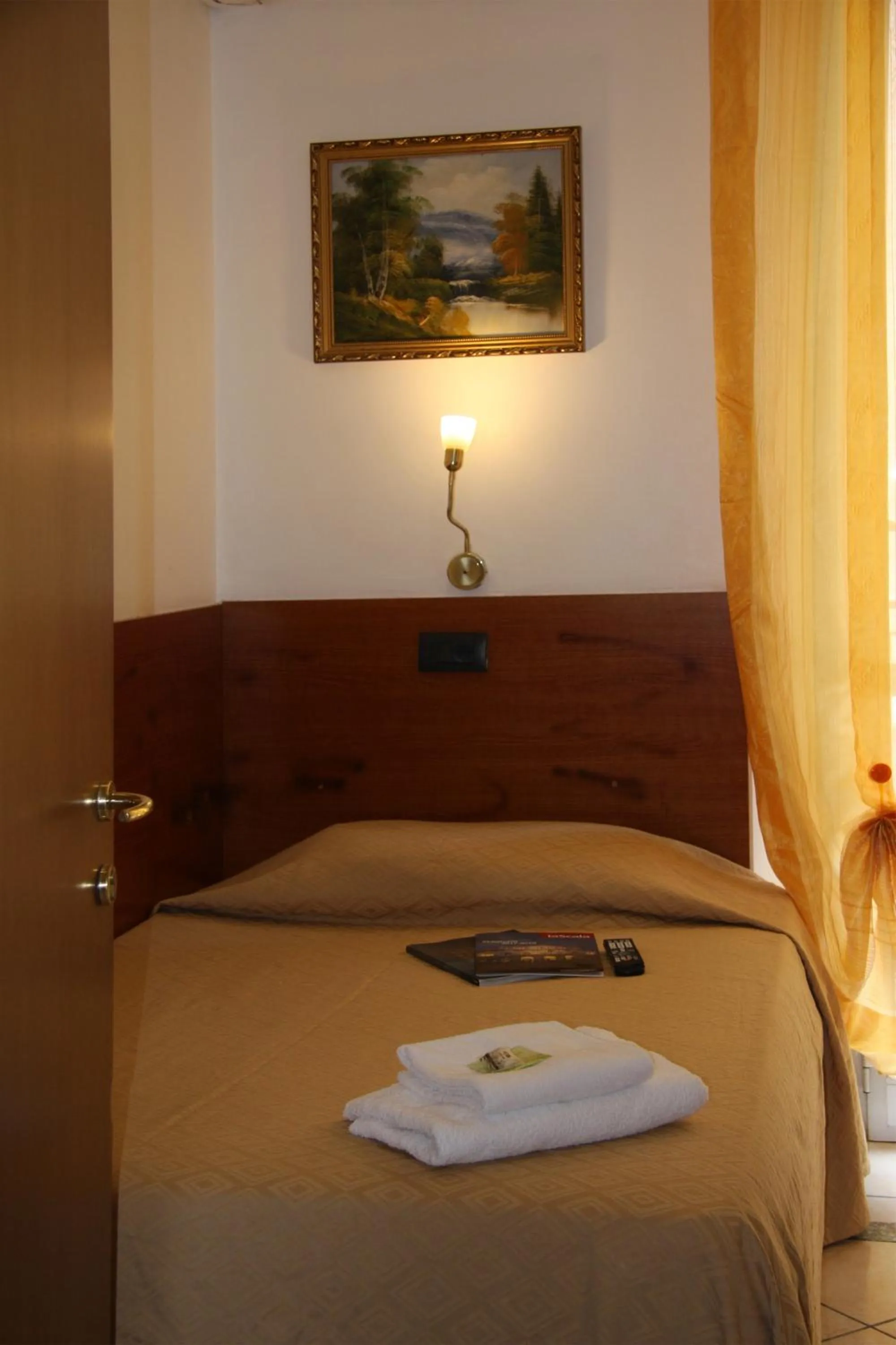 Bed in Hotel Adelchi