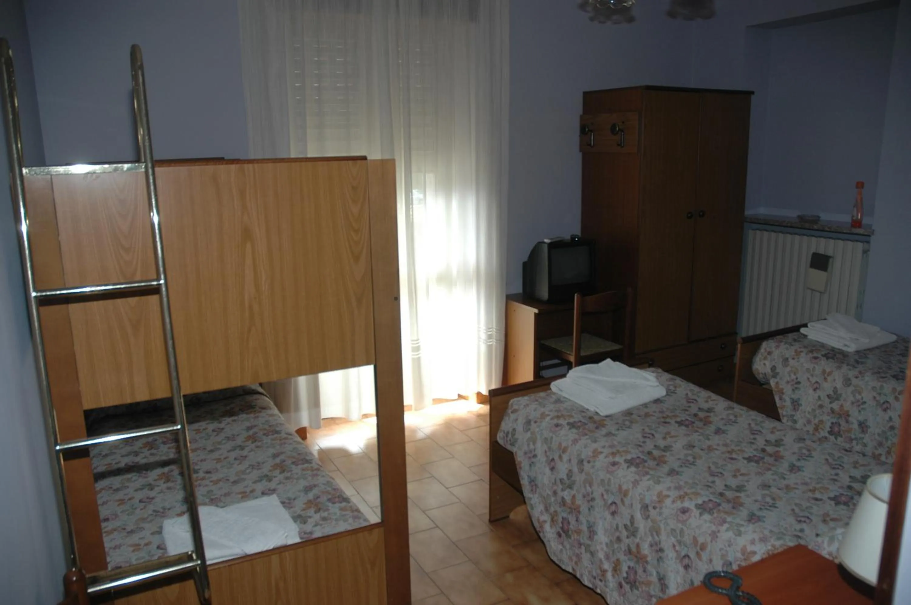 Bed in Hotel Valentino