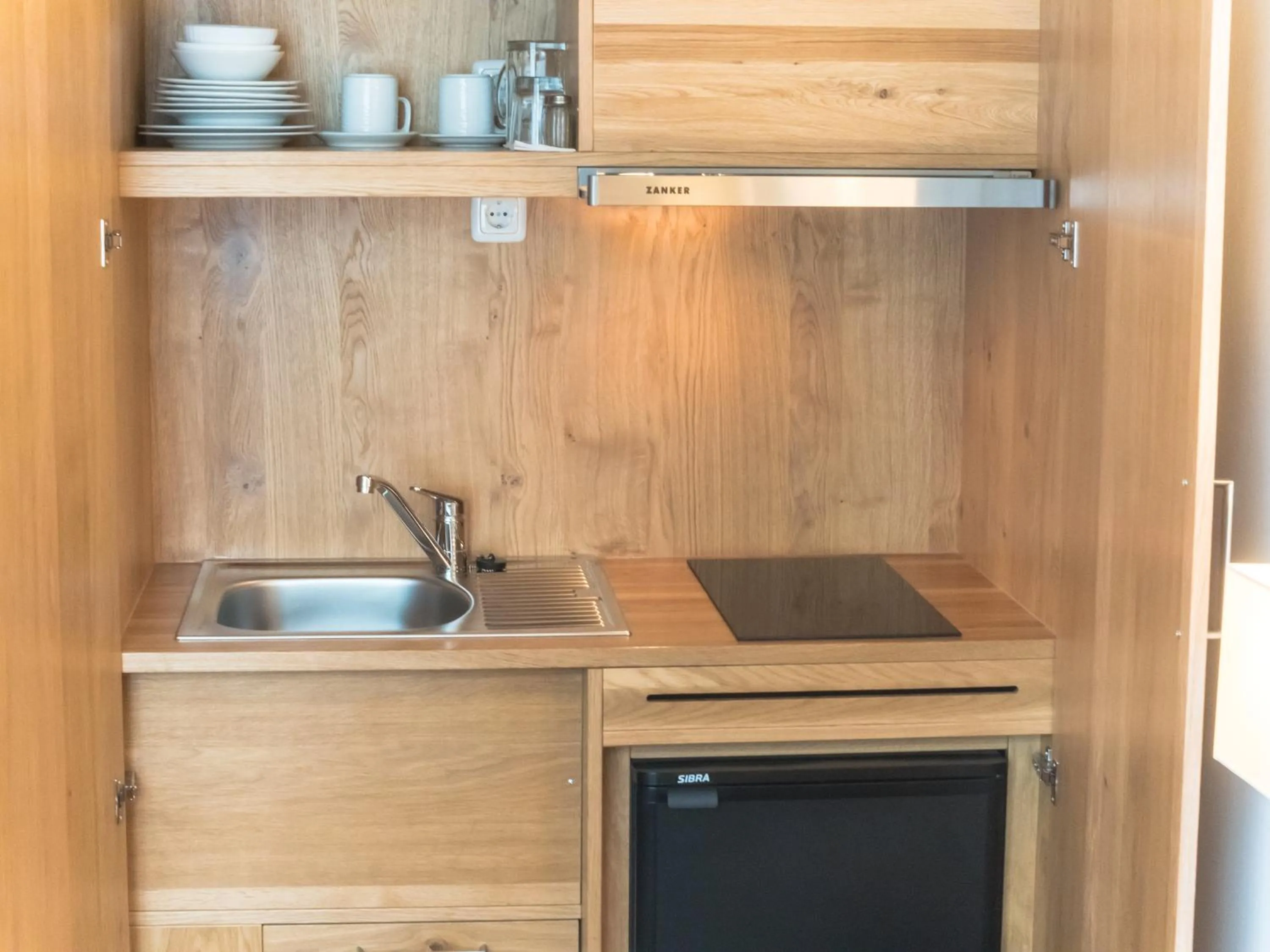 Kitchen or kitchenette in Hotel Lutter