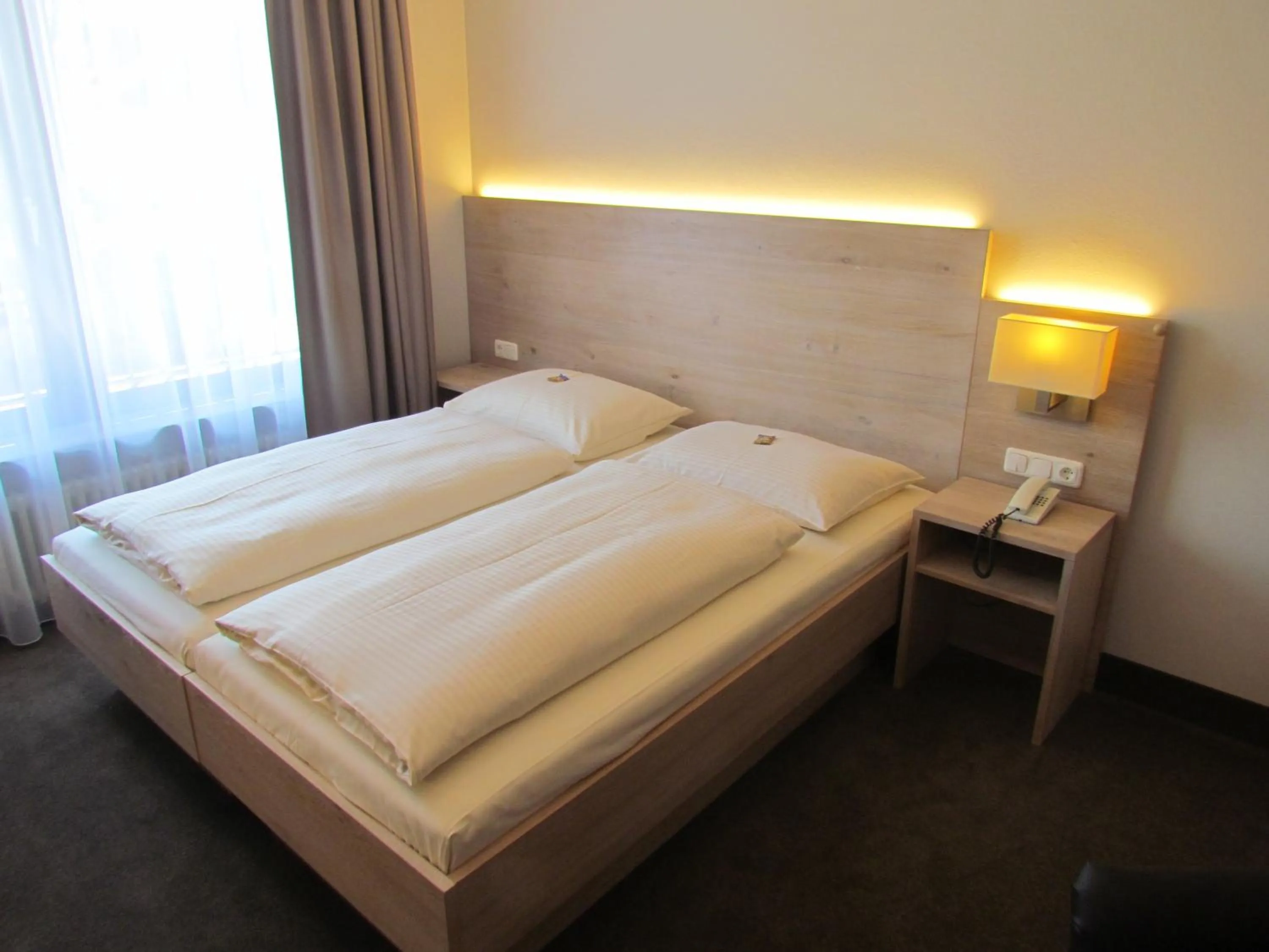 Photo of the whole room, Bed in Hotel Lutter
