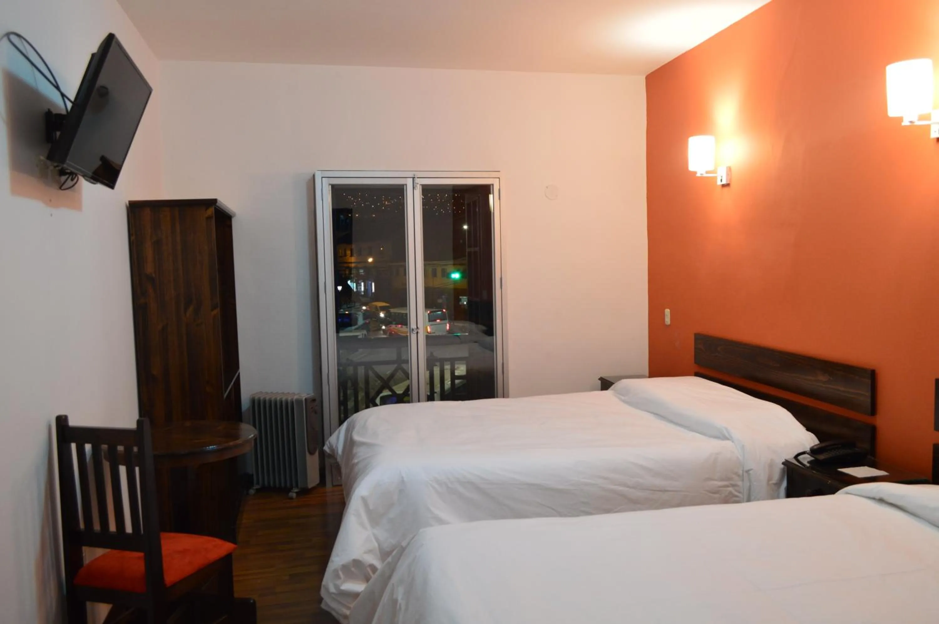 Photo of the whole room, Bed in Hotel Limacpampa