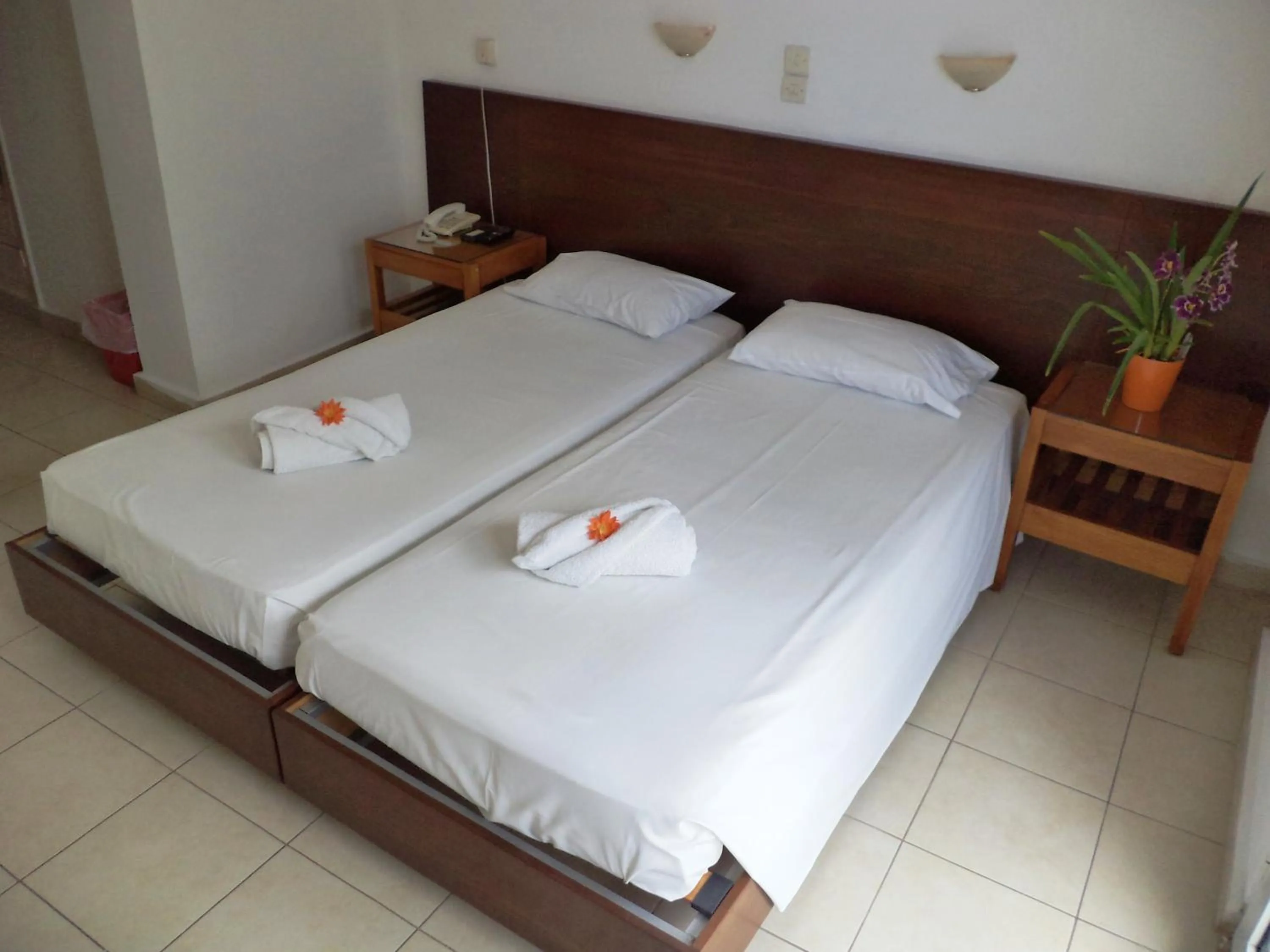 Bed in Poseidon Hotel