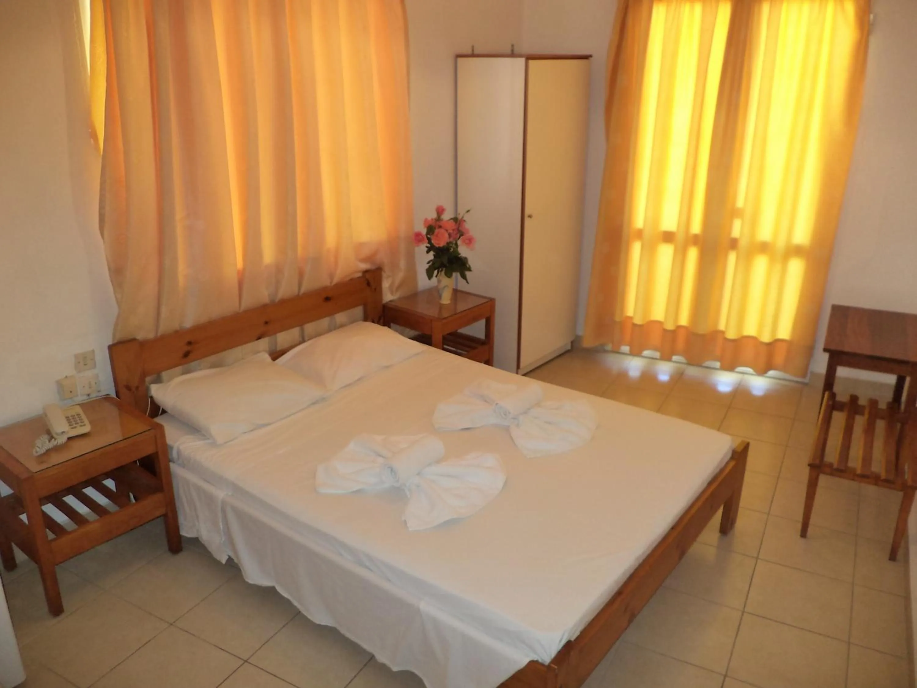 Bed in Poseidon Hotel