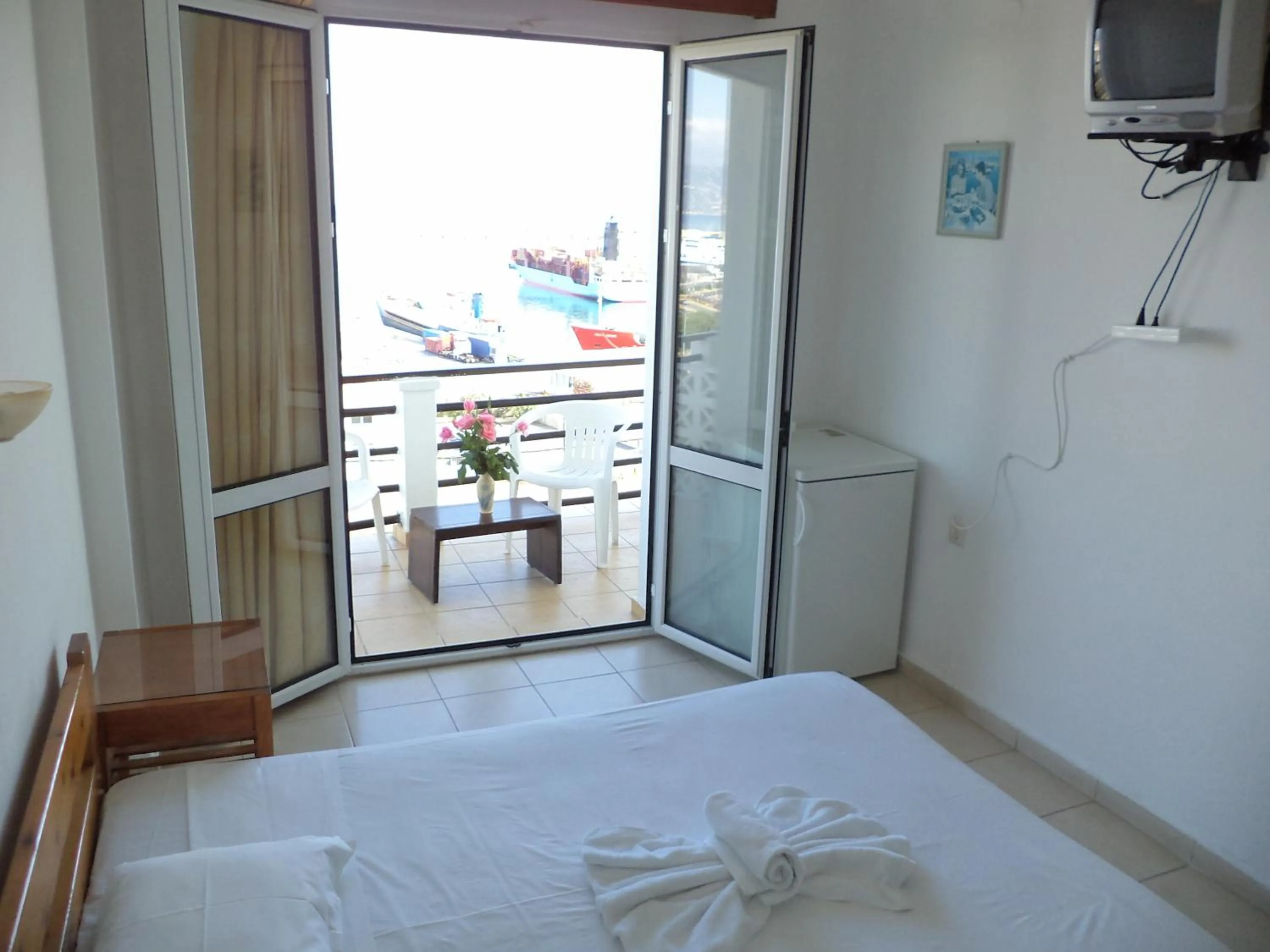 Bed in Poseidon Hotel