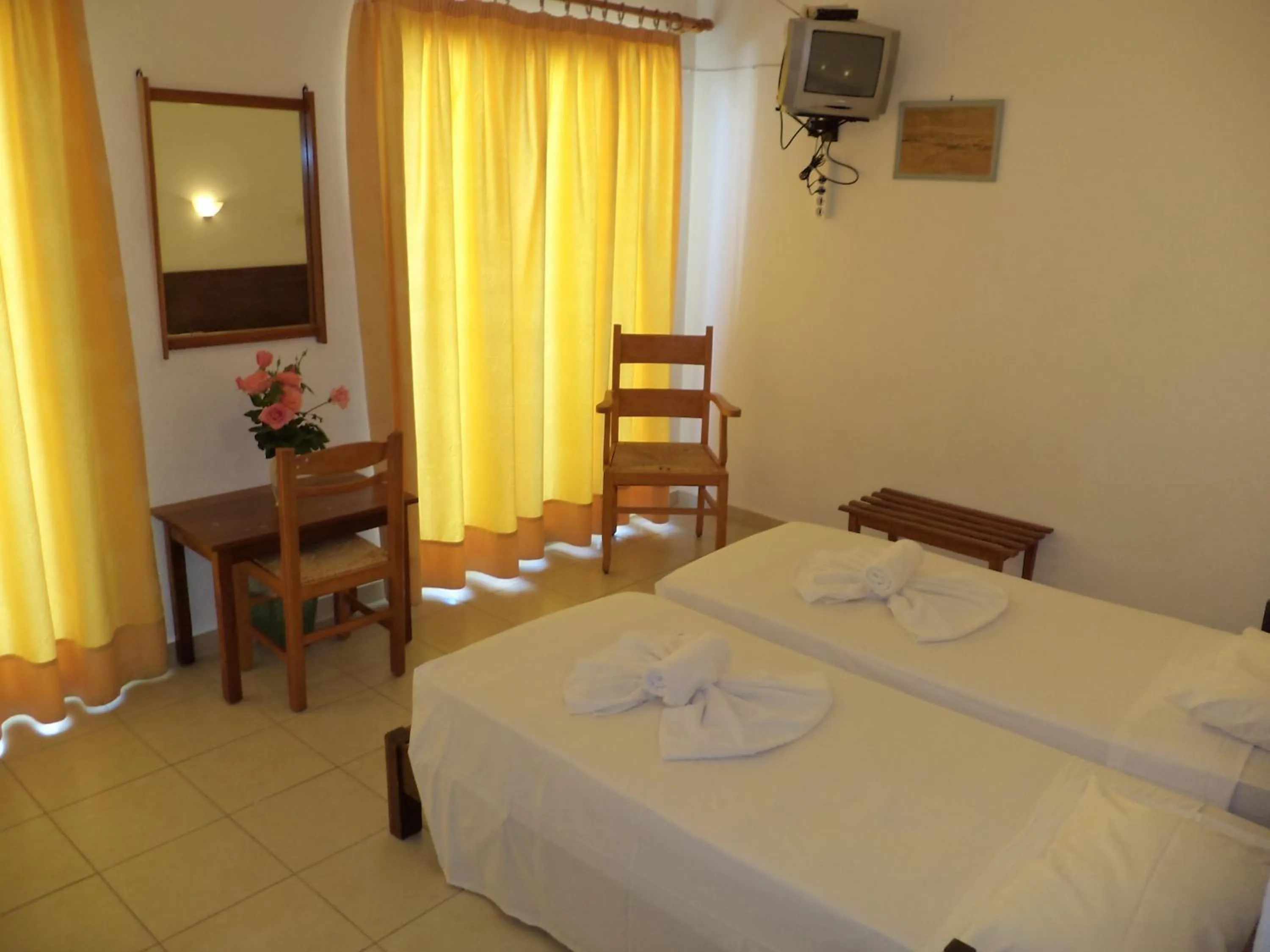 Bed in Poseidon Hotel