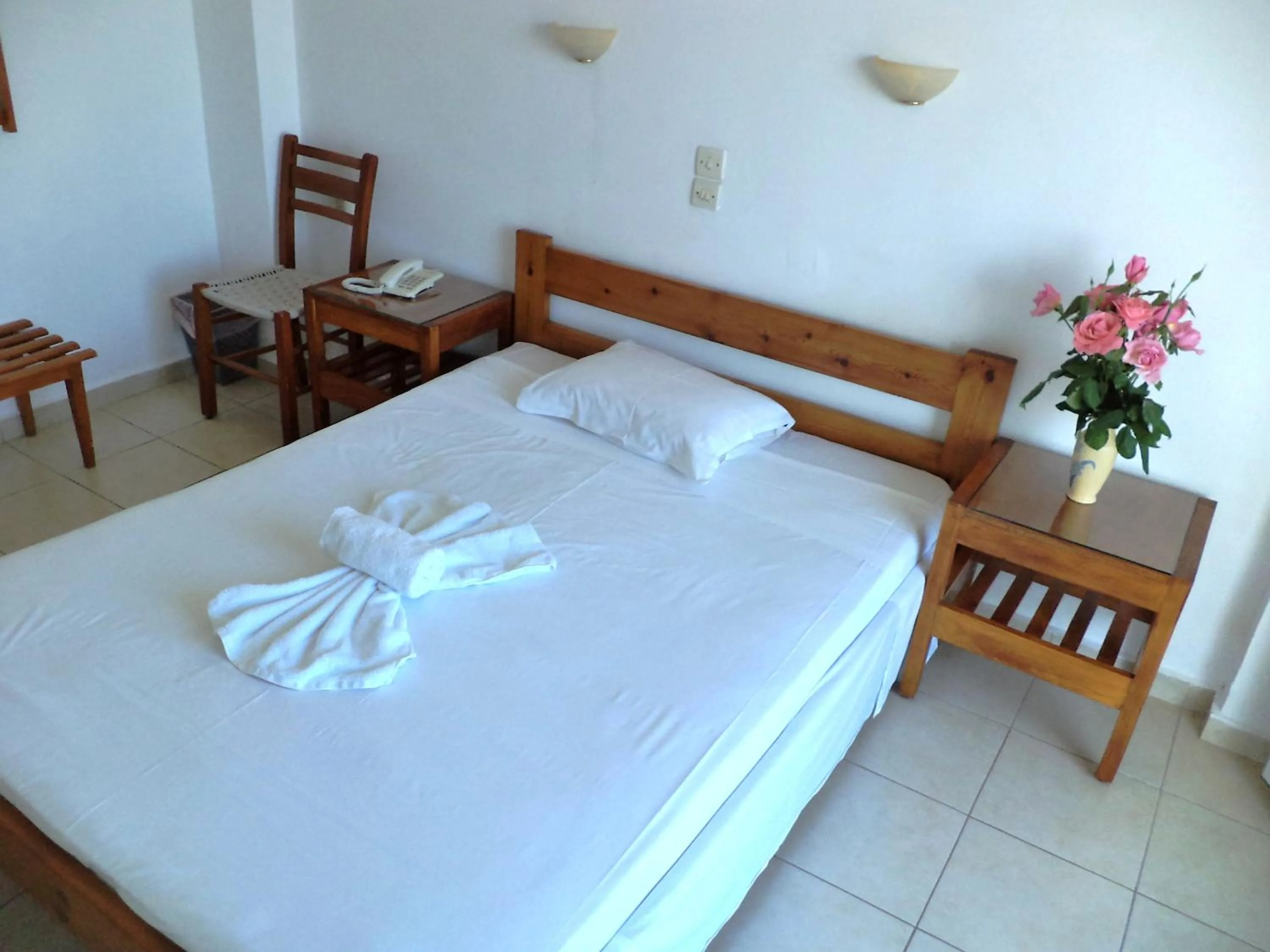 Bed in Poseidon Hotel